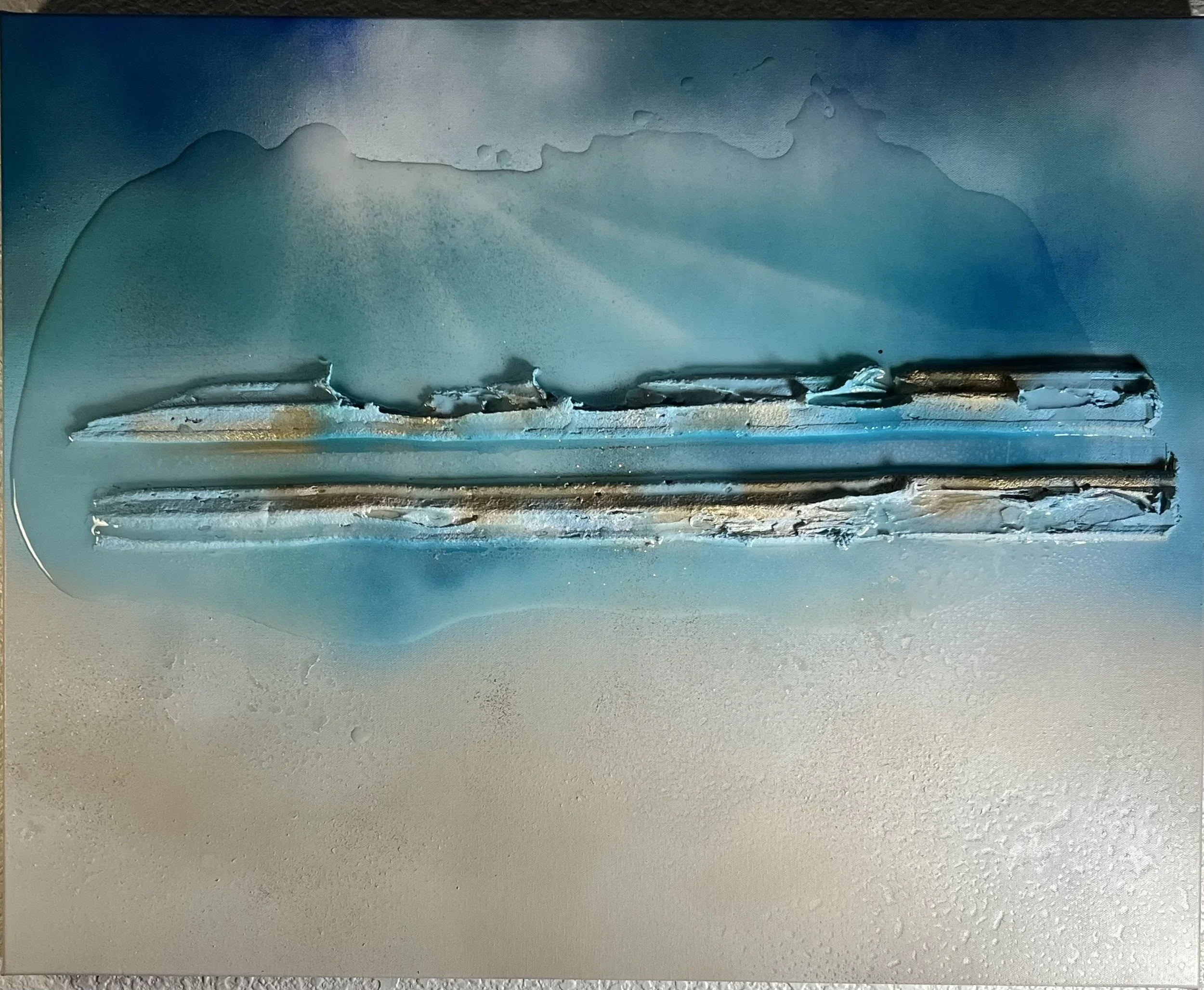 An abstract painting featuring a gradient of blue and teal hues with textured horizontal streaks and subtle speckles.