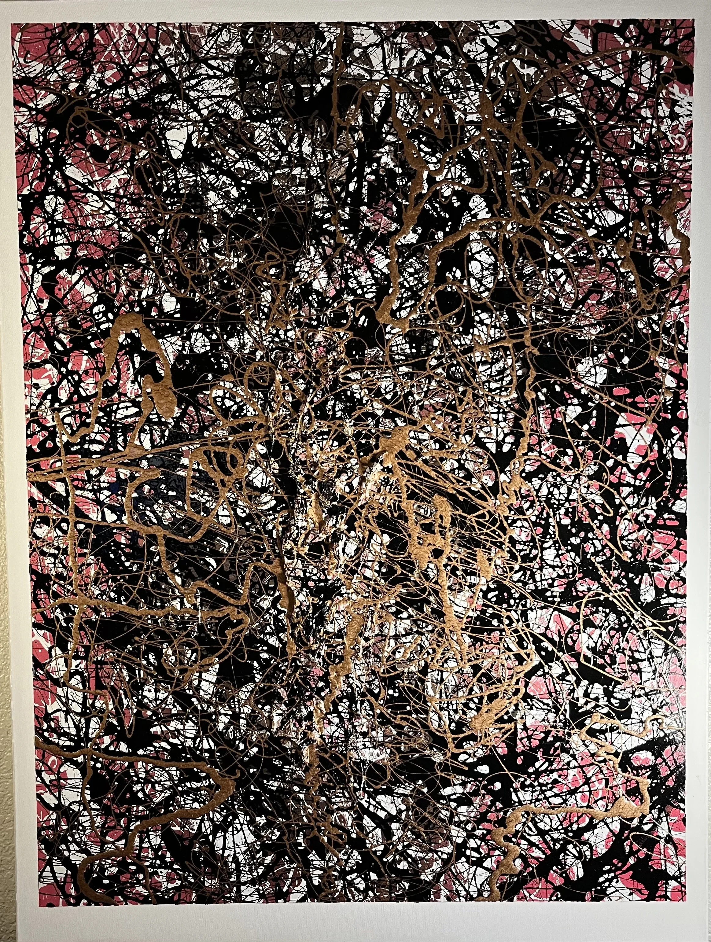 Abstract painting with black, pink, and brown paint splatters and drips.