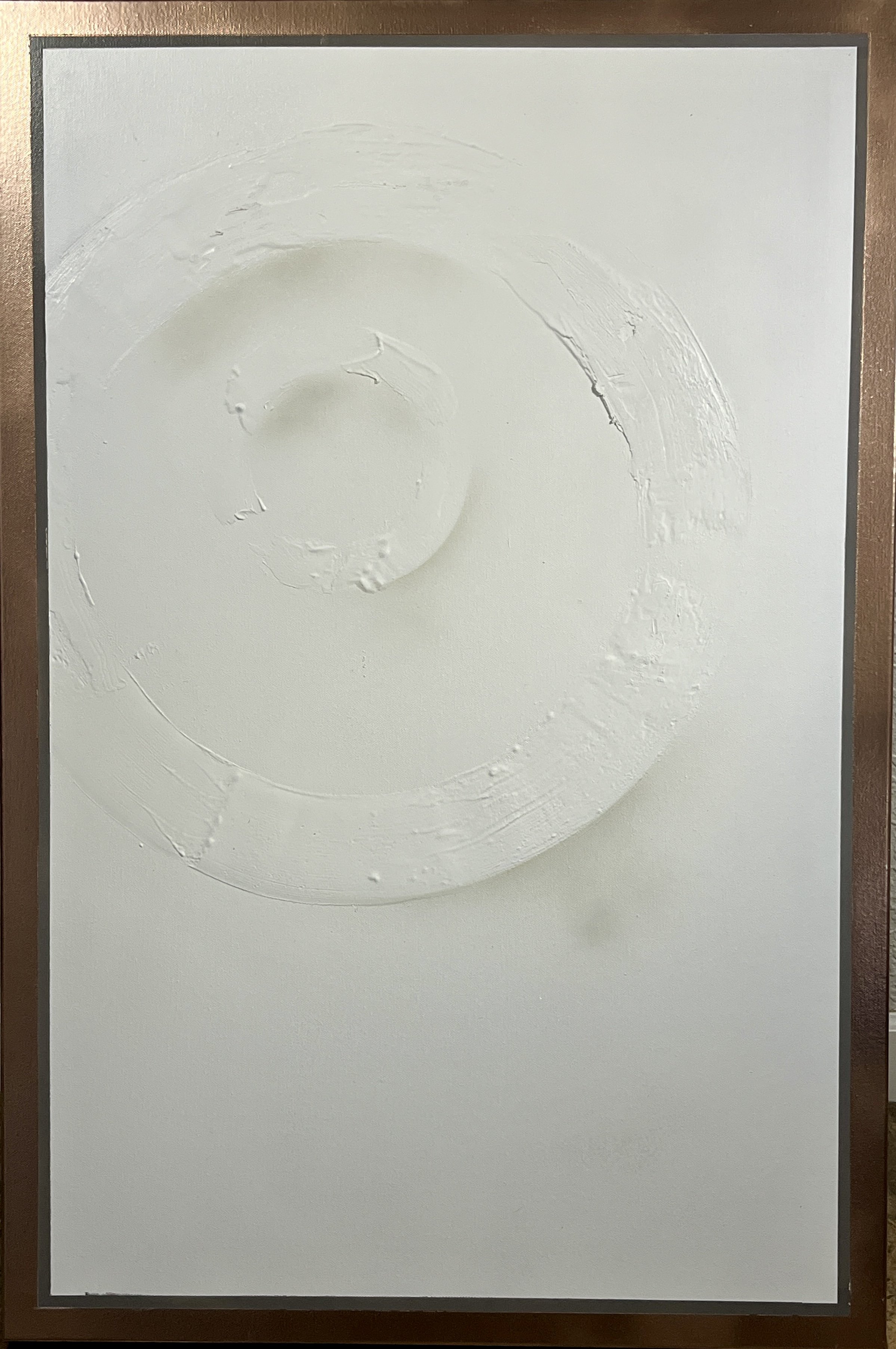 A white textured surface with a circular pattern, possibly created by a brush or palette knife, on a white background.