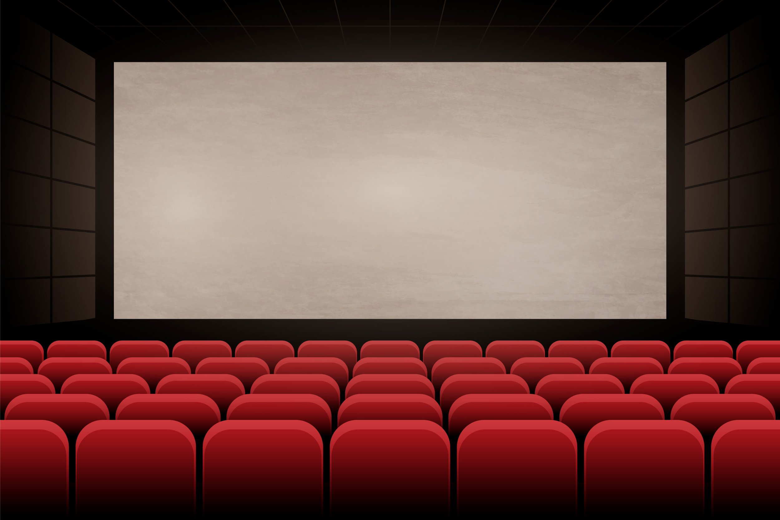 An empty movie theater with rows of red seats and a large blank screen on the front wall.