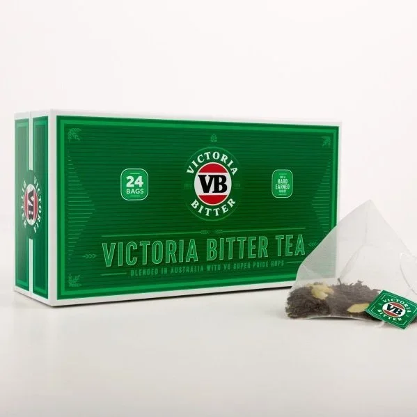 Box of Victoria Bitter Tea with 24 tea bags inside, plastic tea bag with tea leaves next to the box.