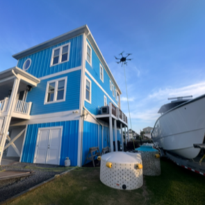 Drone+Washing+Blue+House.png