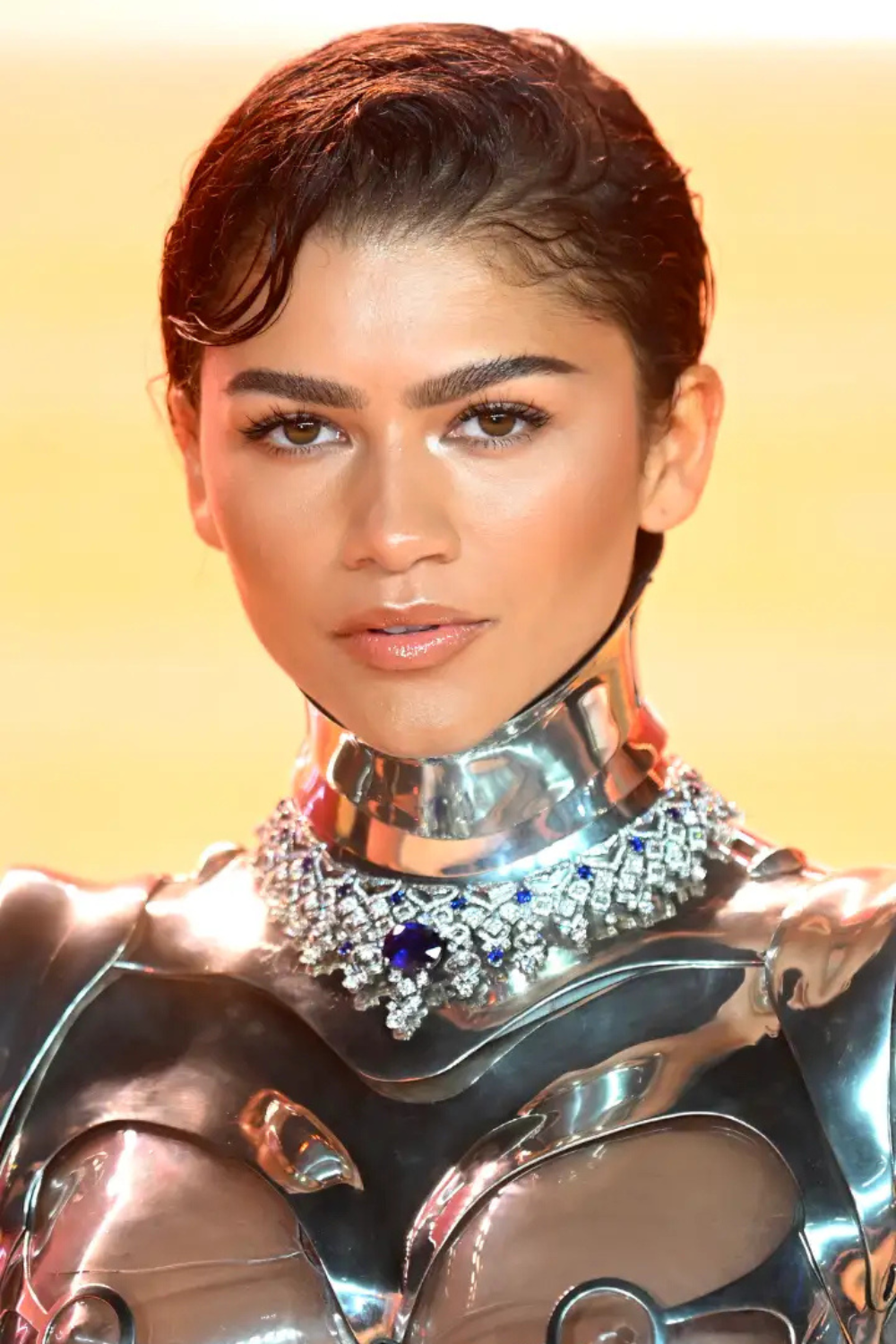 zendaya-mugler-robot-suit-close-up-dune-press-tour.png