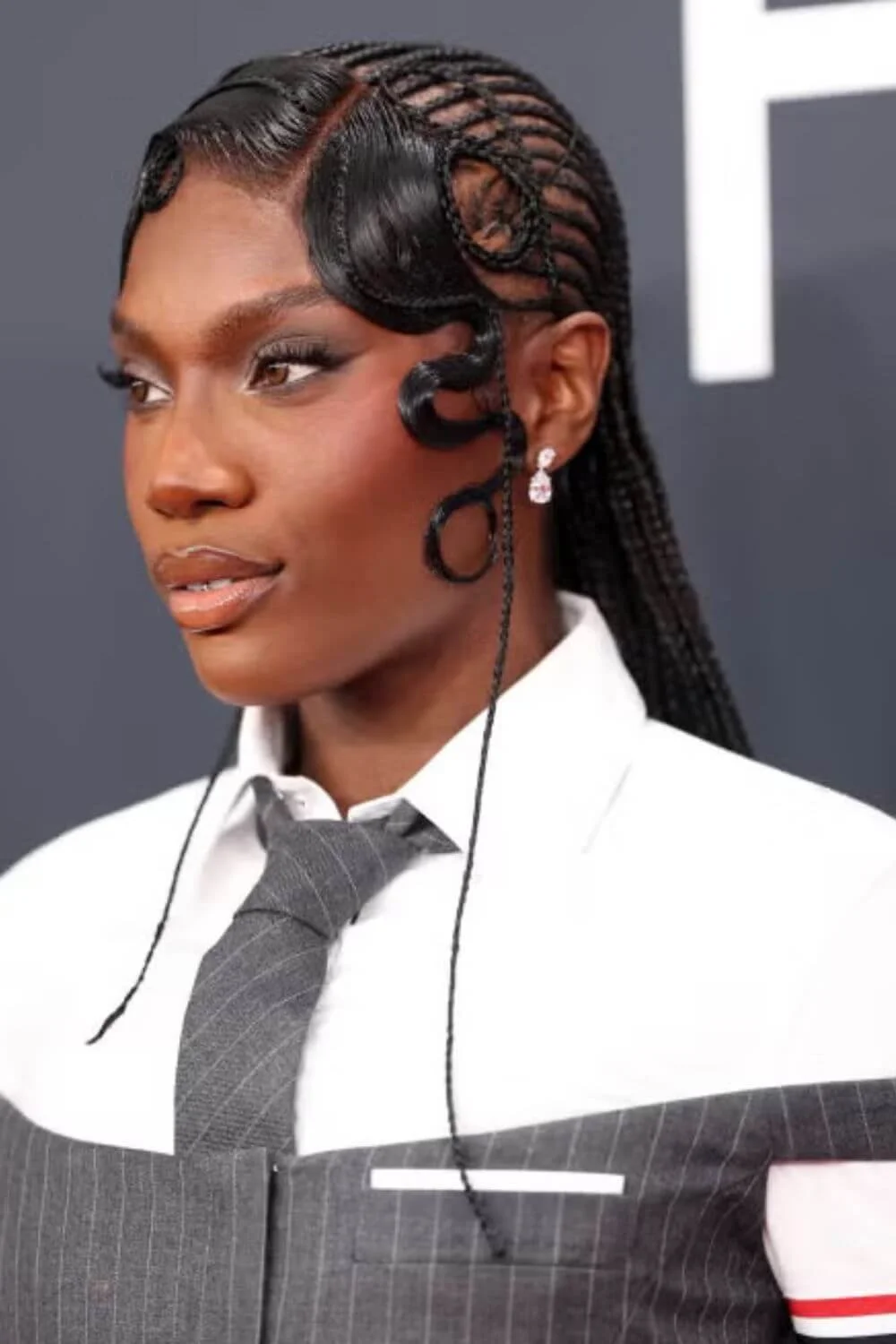 doechii-braided-hairstyle-sculpted-edges-structured-look.jpg