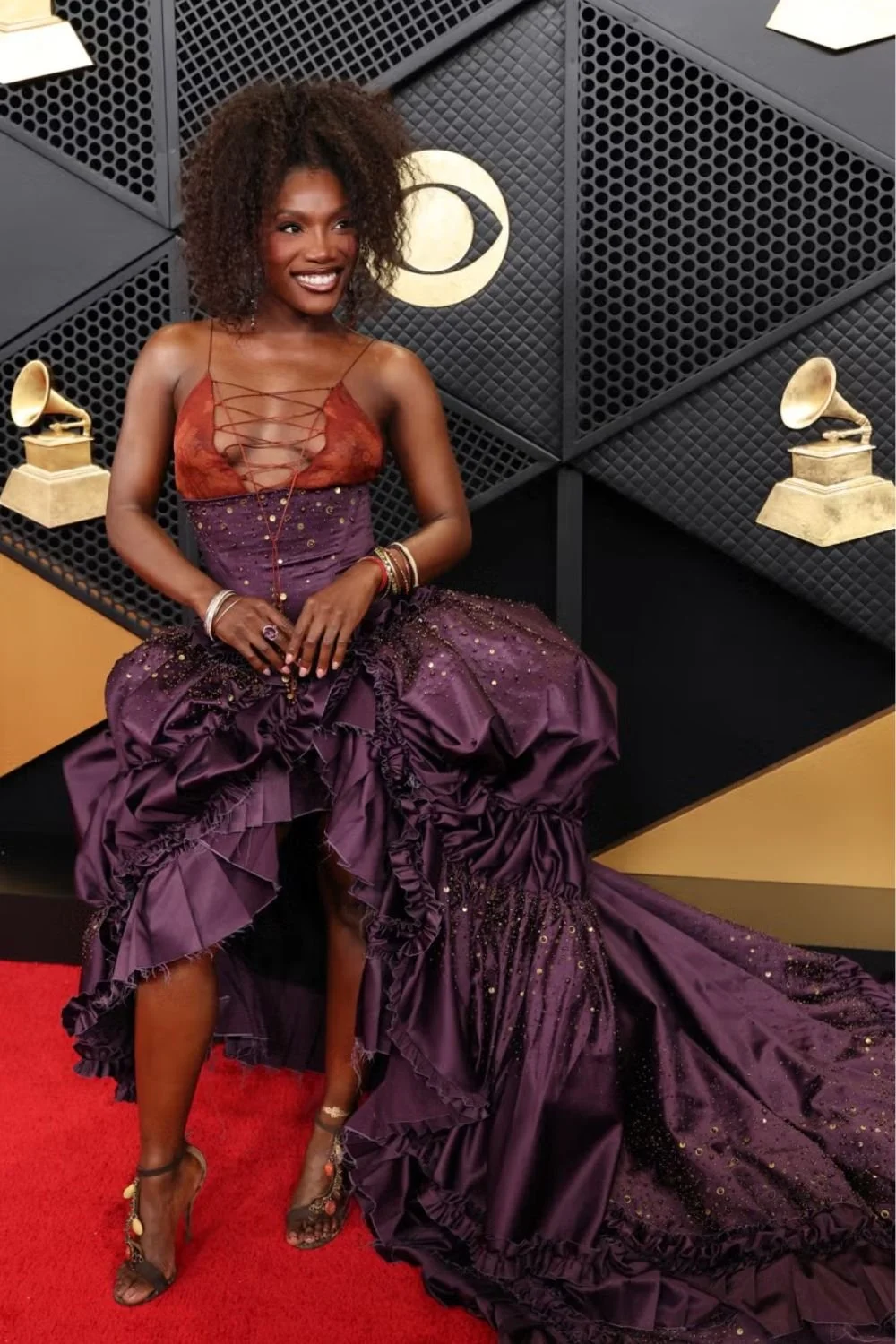 doechii-purple-corset-gown-ruffled-train-grammys-red-carpet.jpg