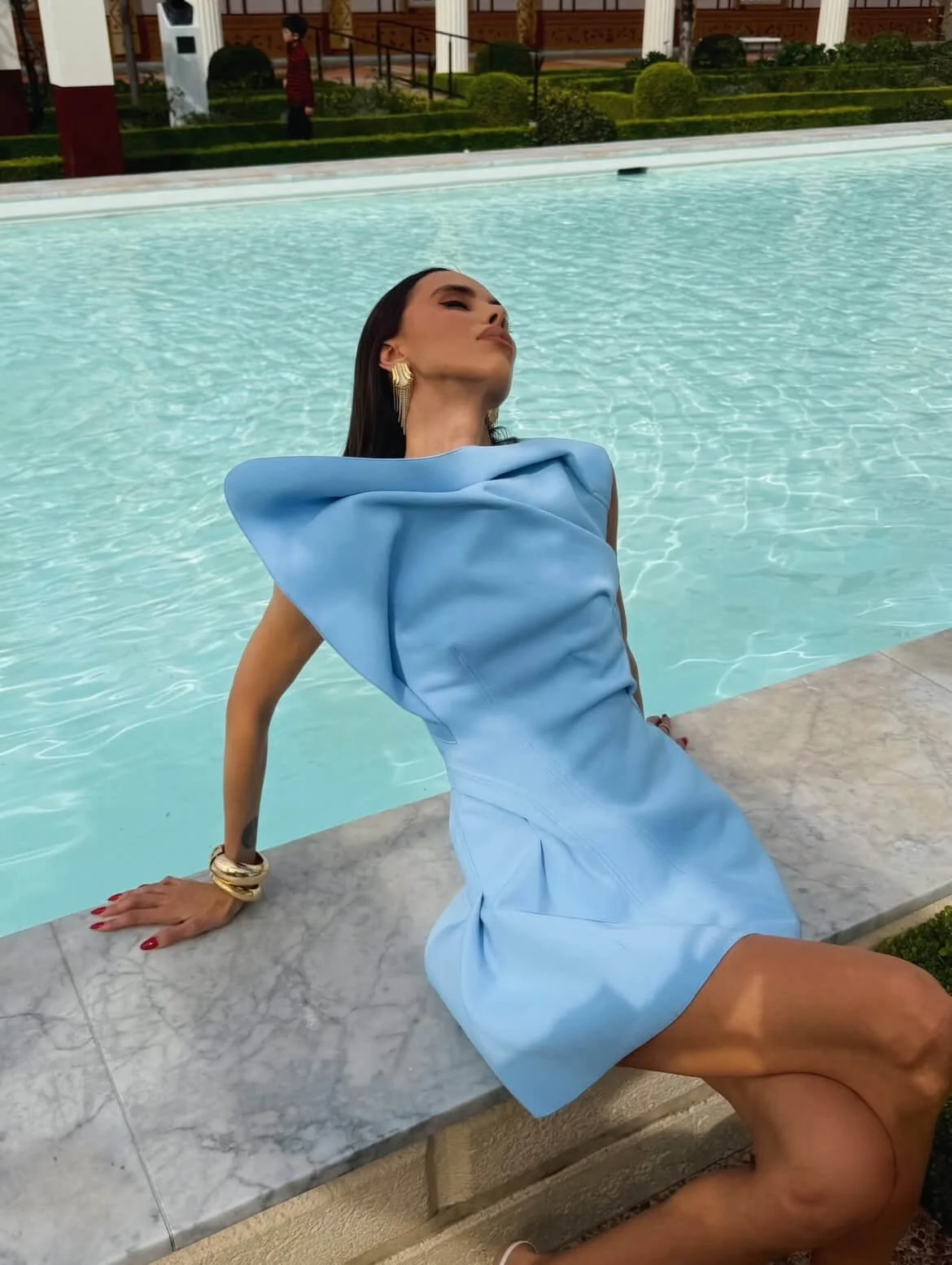 Why Katerina Kraz’s Structured Blue Dress Proves You Don’t Need to Style an Outfit