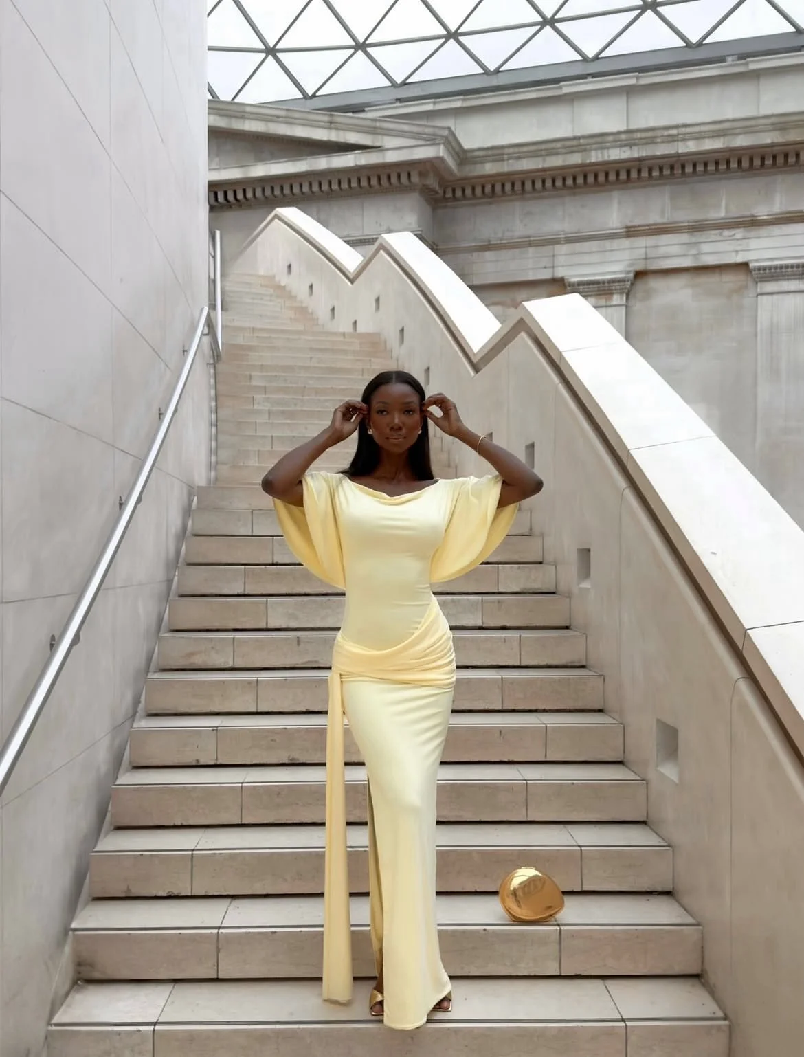 Sia’s Yellow Dress Proves You Don’t Need Stiff Pieces to Look Structured