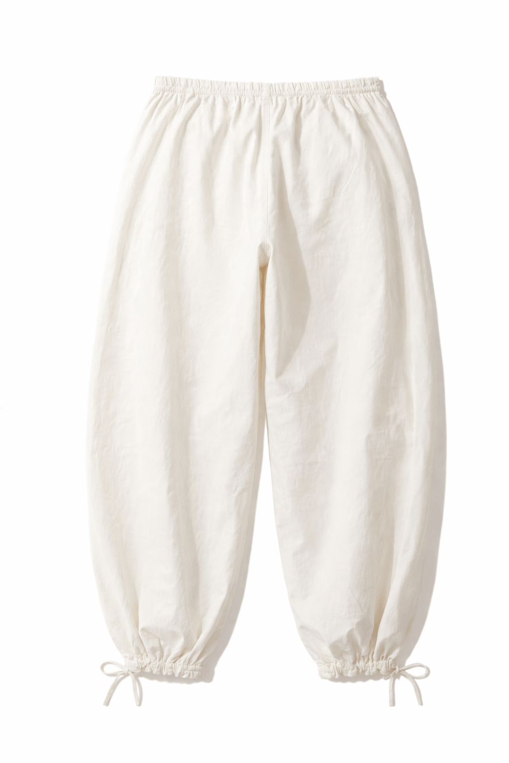 cream-balloon-trousers-high-waist-structured-volume-editorial-white-background.png