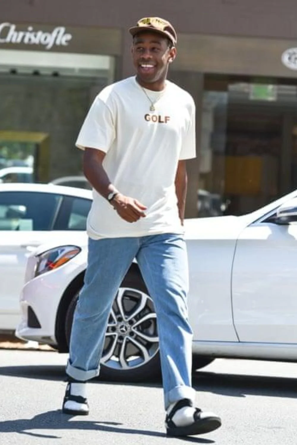tyler-the-creator-golf-tee-jeans-loafers-casual-outfit.jpg