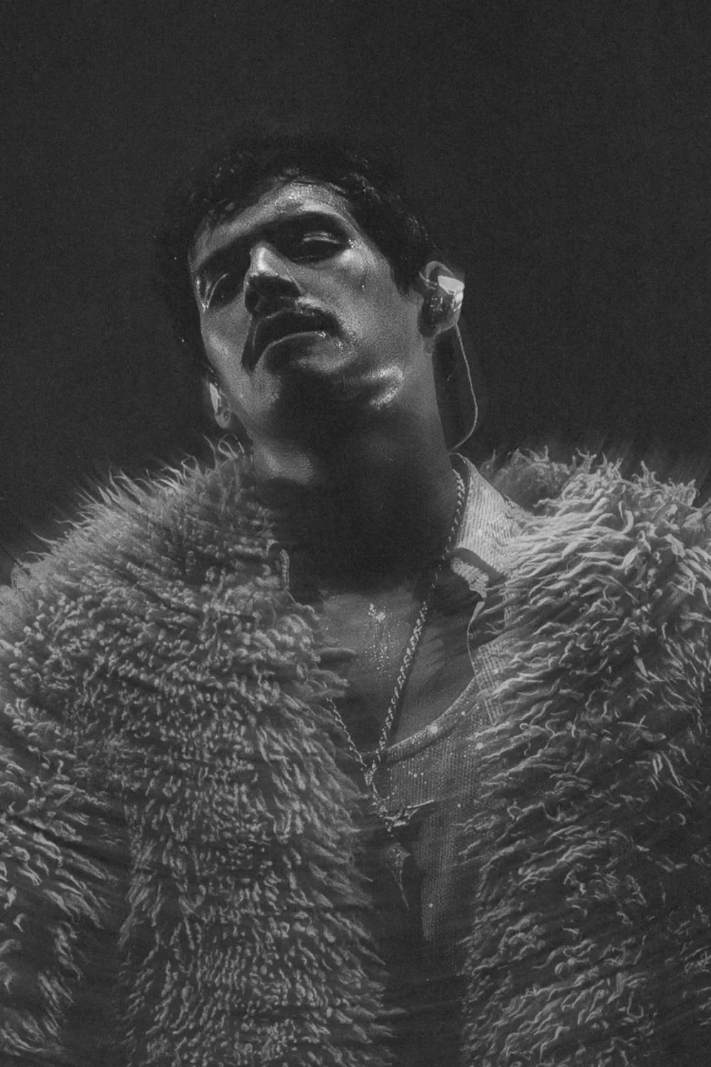 omar-apollo-black-and-white-fur-performance-portrait.jpg