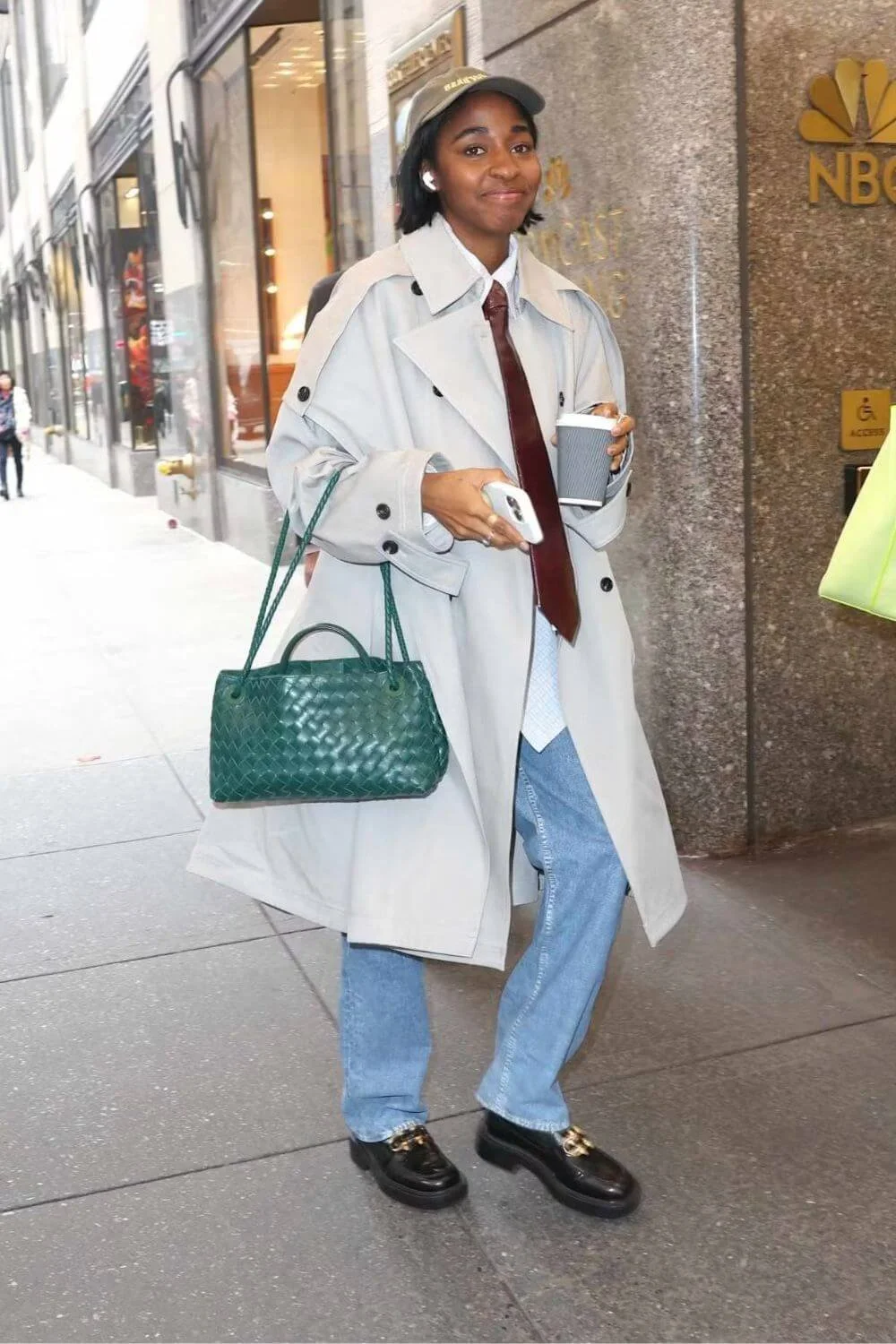 ayo-edebiri-off-duty-style-bottega-trench-tie-jeans.jpg