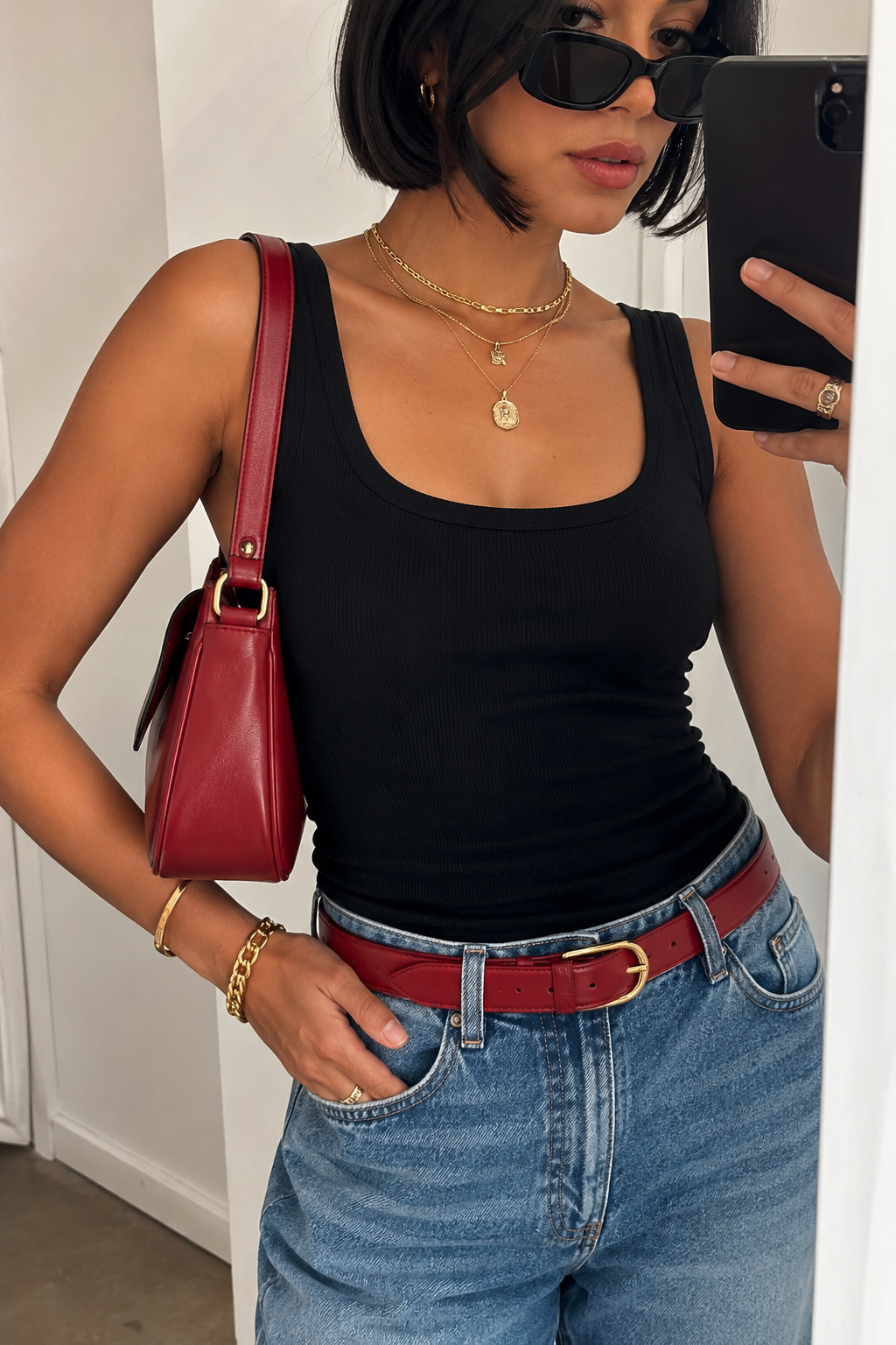 red belt outfit ideas jeans.png