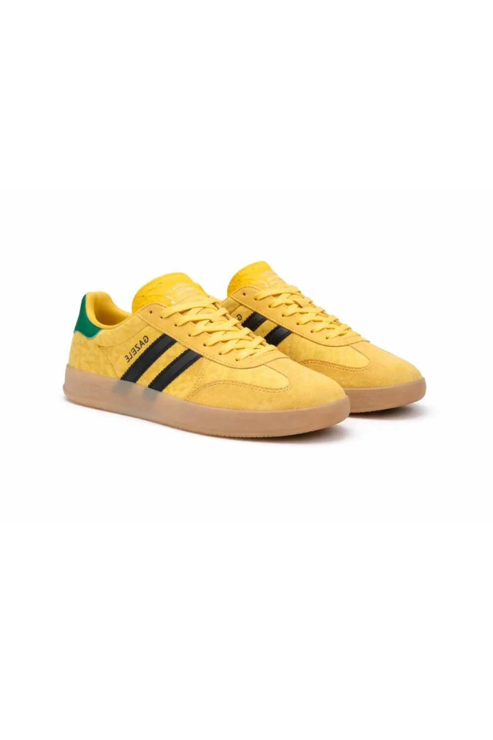 Yellow Adidas Gazelle Indoor sneakers with black stripes and gum sole