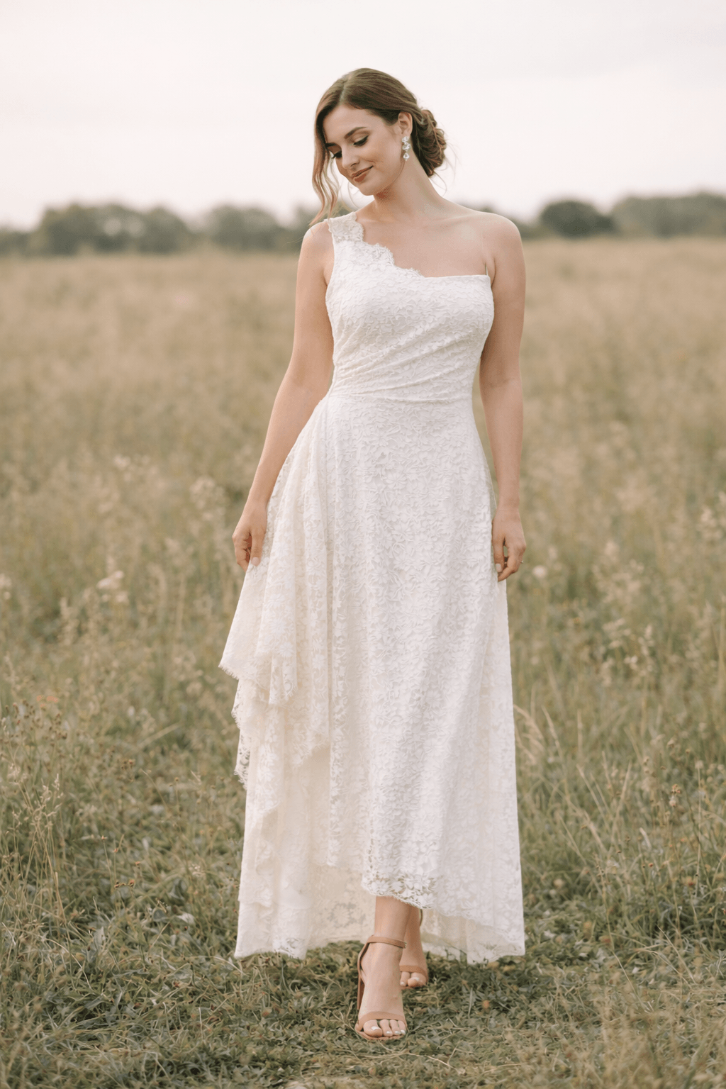 women in romantic tiered boho elopement dress. this listicle gives brieds the best options on elopement dresses and where to buy