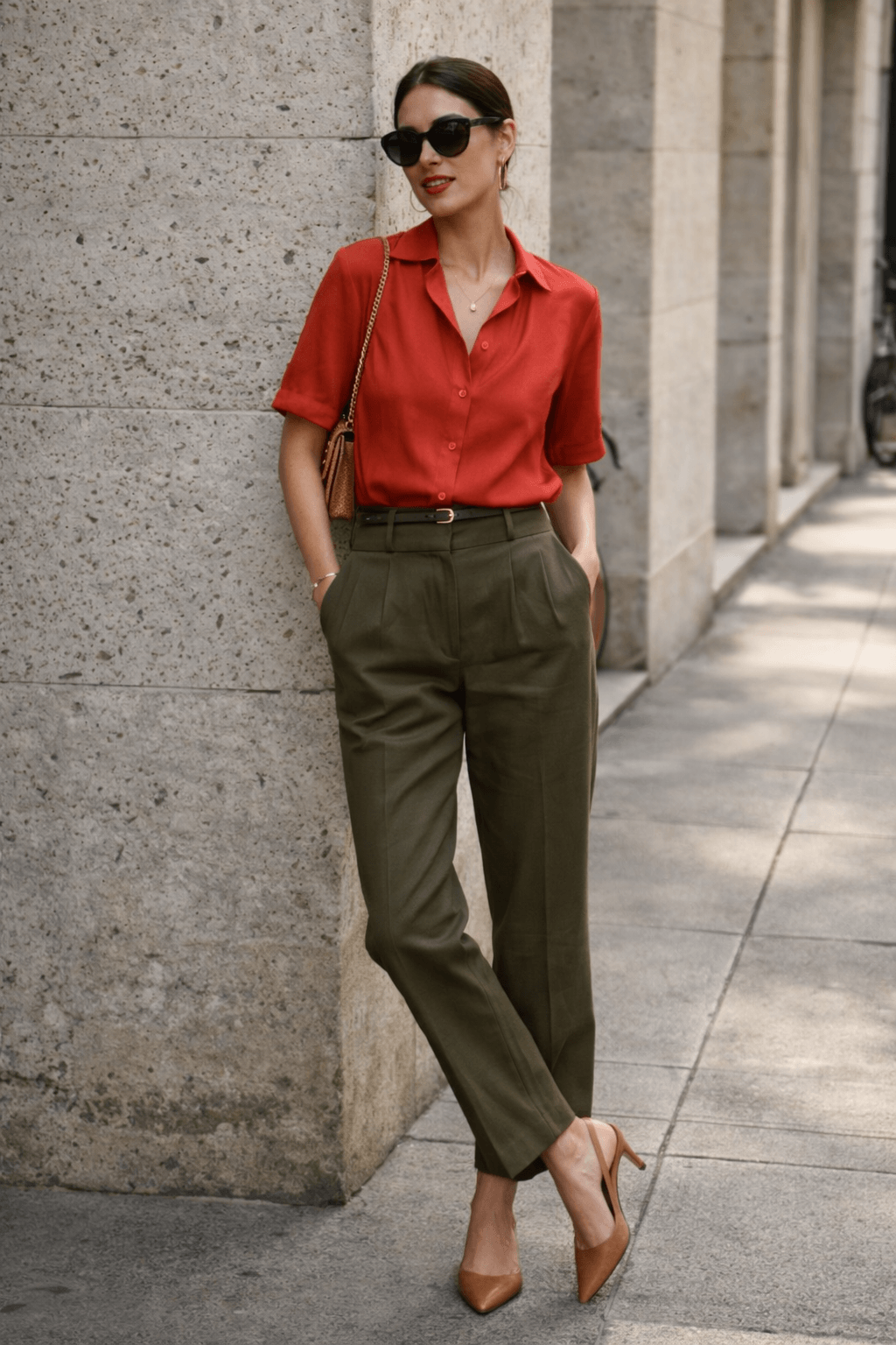 Summer aesthetic outfit ideas featuring a red blouse with tailored trousers styled for a polished summer look.