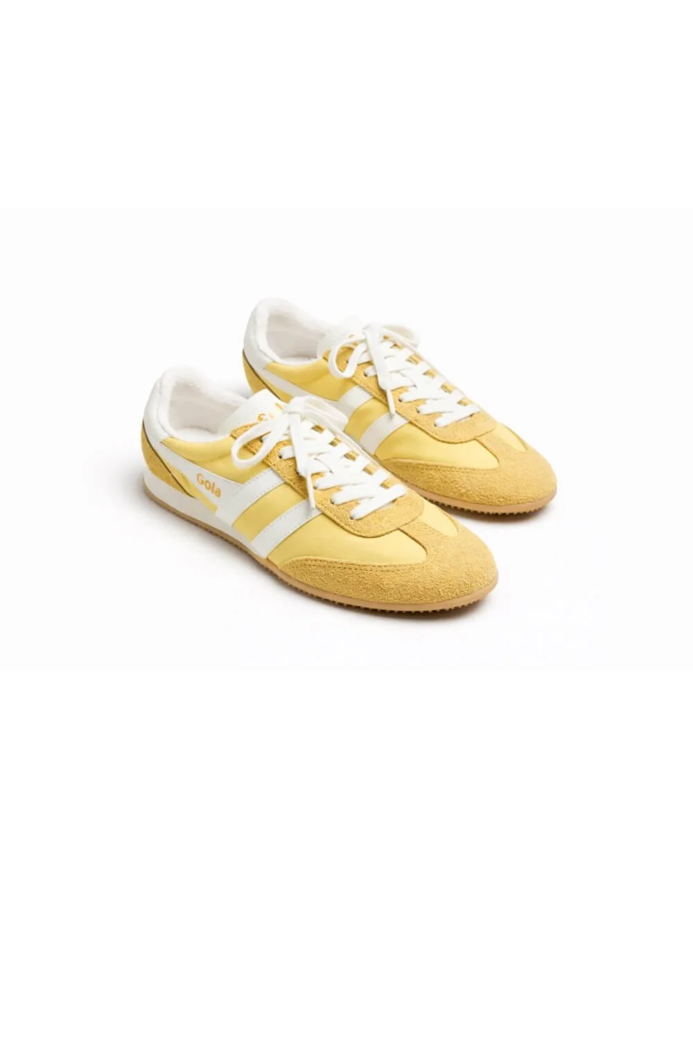 Yellow Gola Sprinter sneakers with white stripes and gum sole on white background
