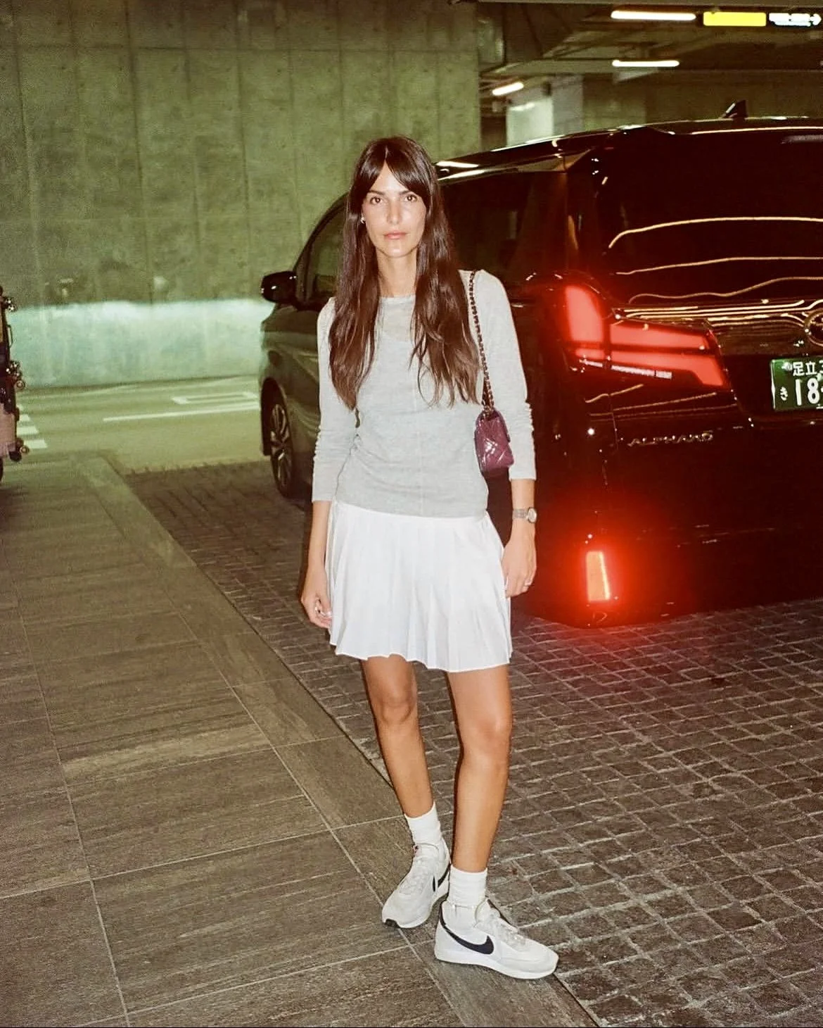 grey mini skirt outfit styled with sneakers casual street style