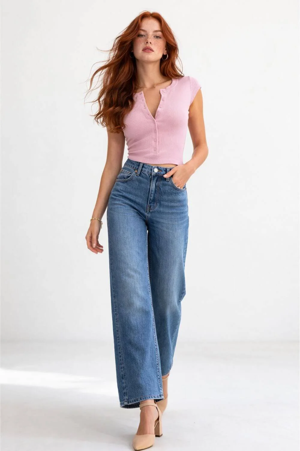 pink fitted top with wide leg jeans feminine outfit