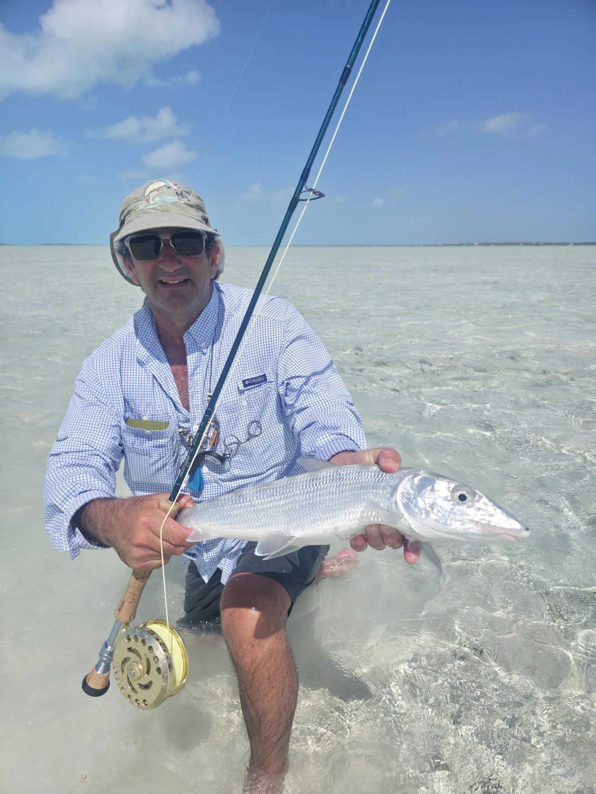 Wading the flats of Exuma. Cathing a nice one