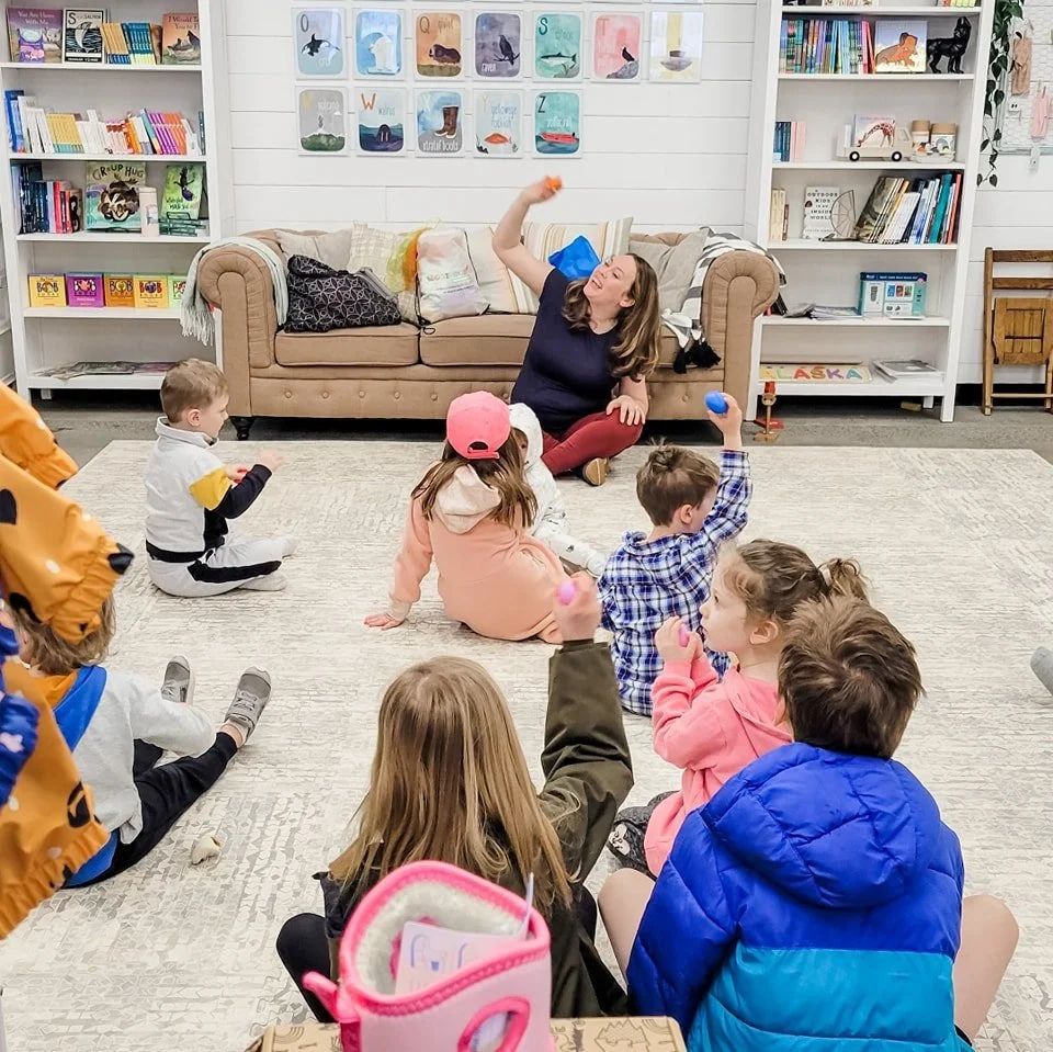 Greenhouse Music Community Class Mrs Delana Green teaching young kids shaking shaker instruments