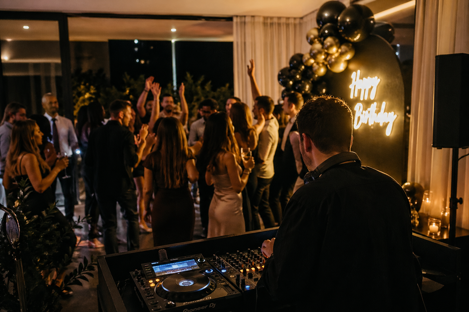 Professional DJ playing at a birthday party