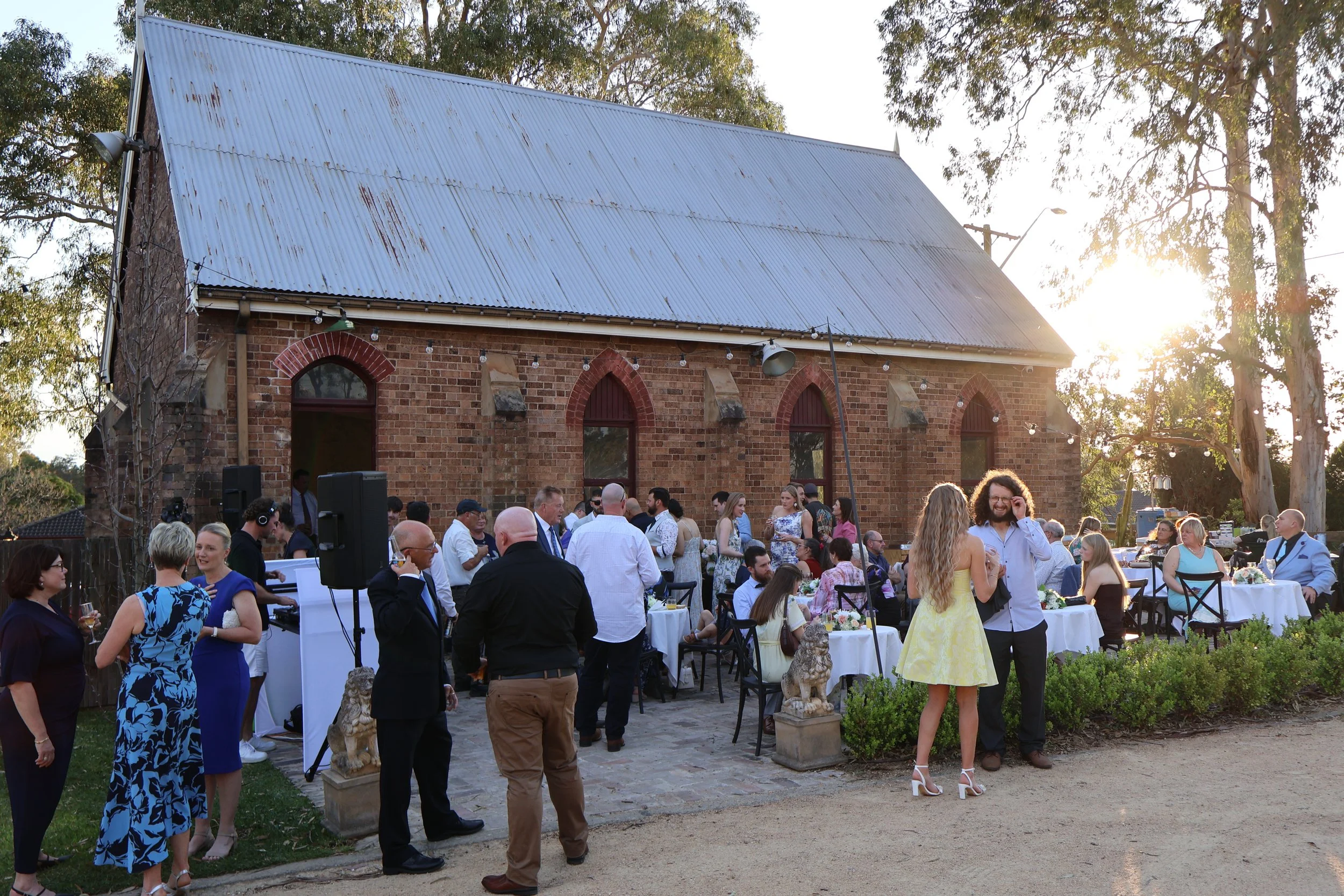 Wedding guests outside the historic chapel at Lords Estate Heritage, Seven Hills