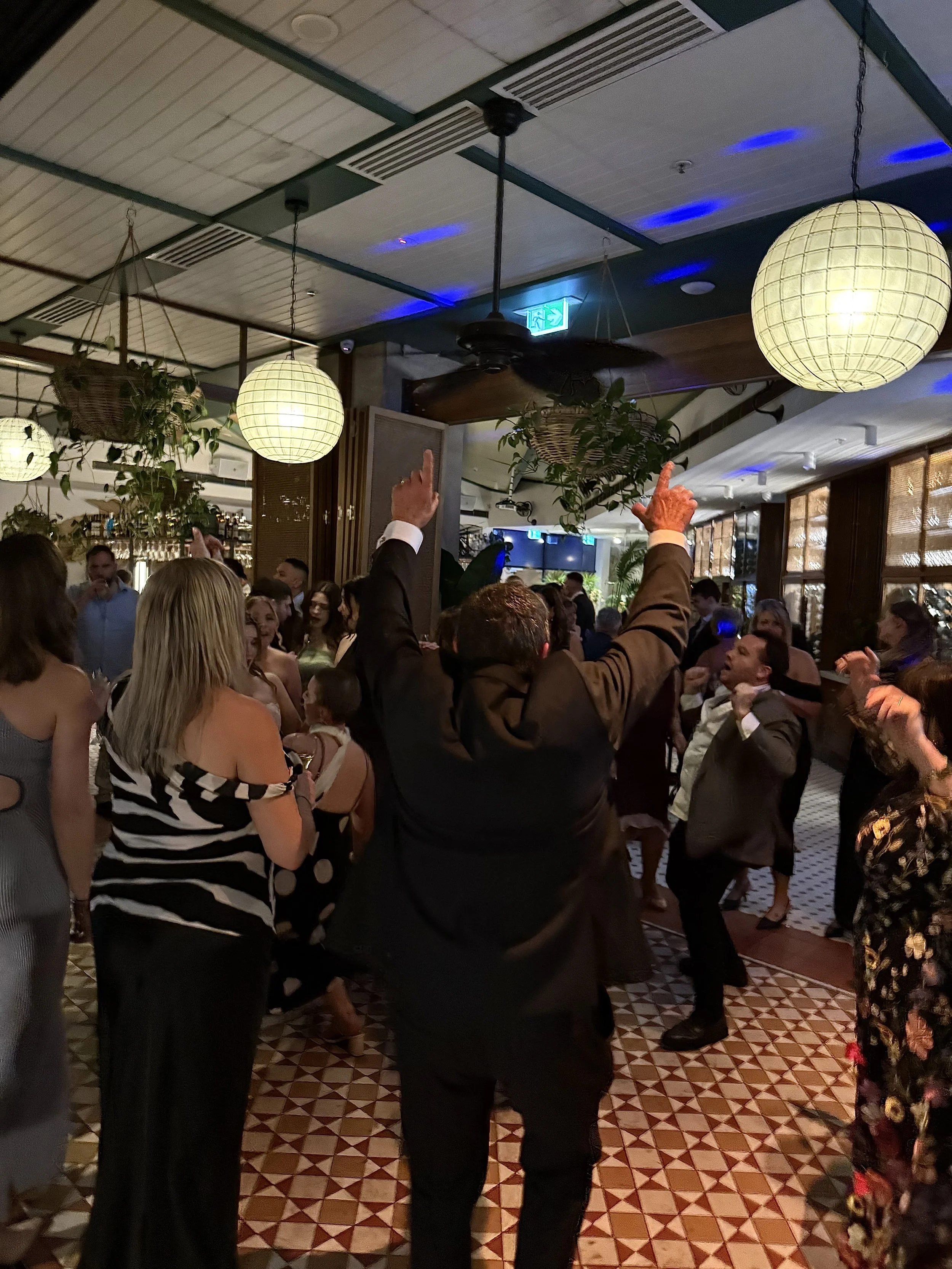 Guests under lanterns at a 30th birthday party in Sydney