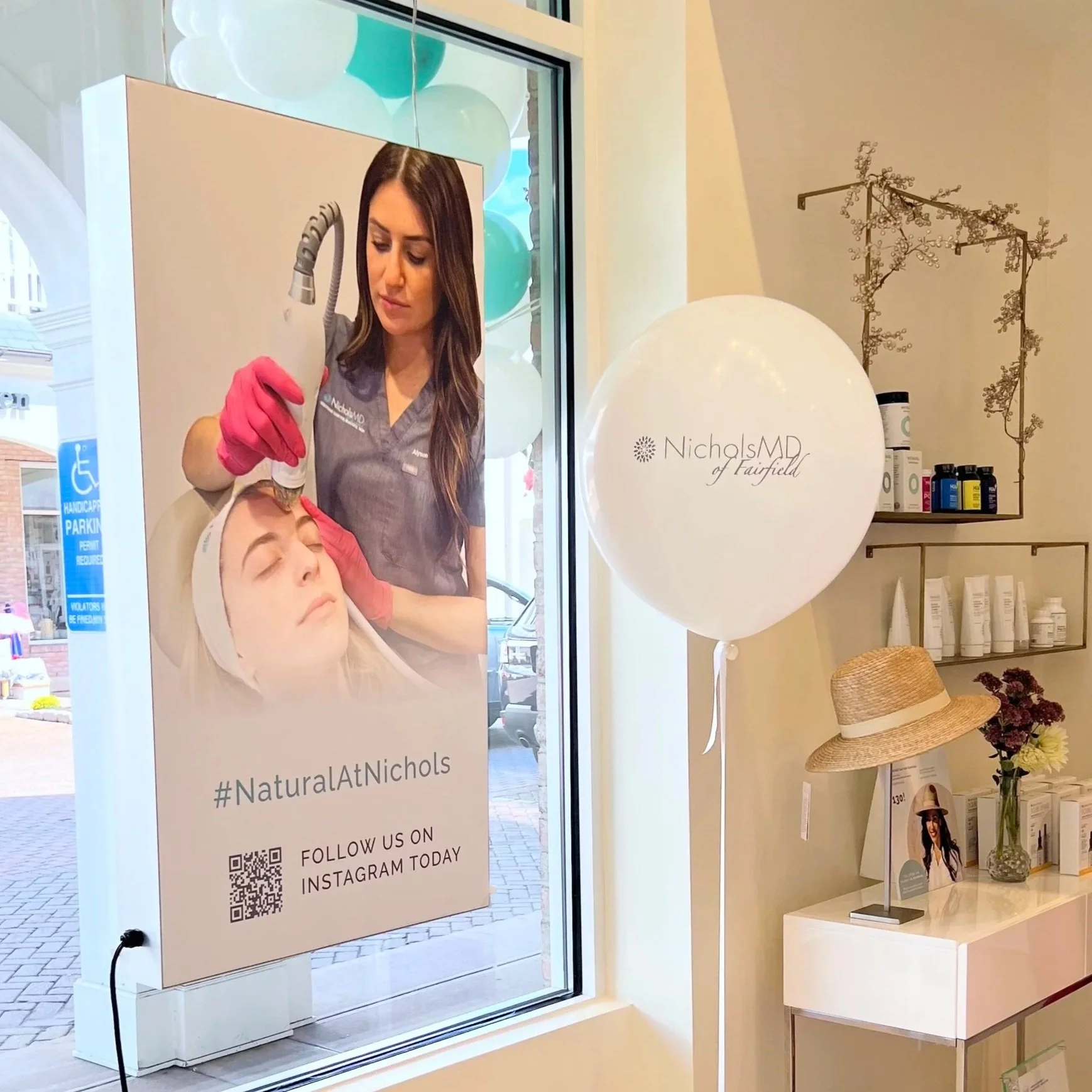 White helium balloons with company logo for Nichols MD Fairfield