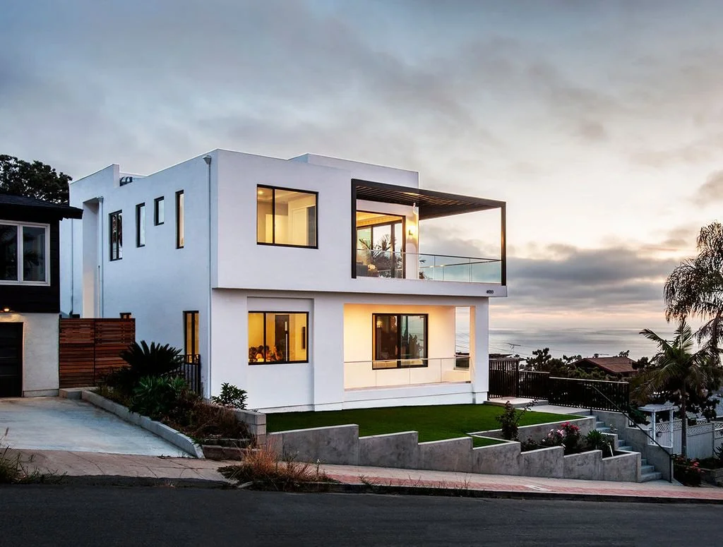 White two story house on the beach