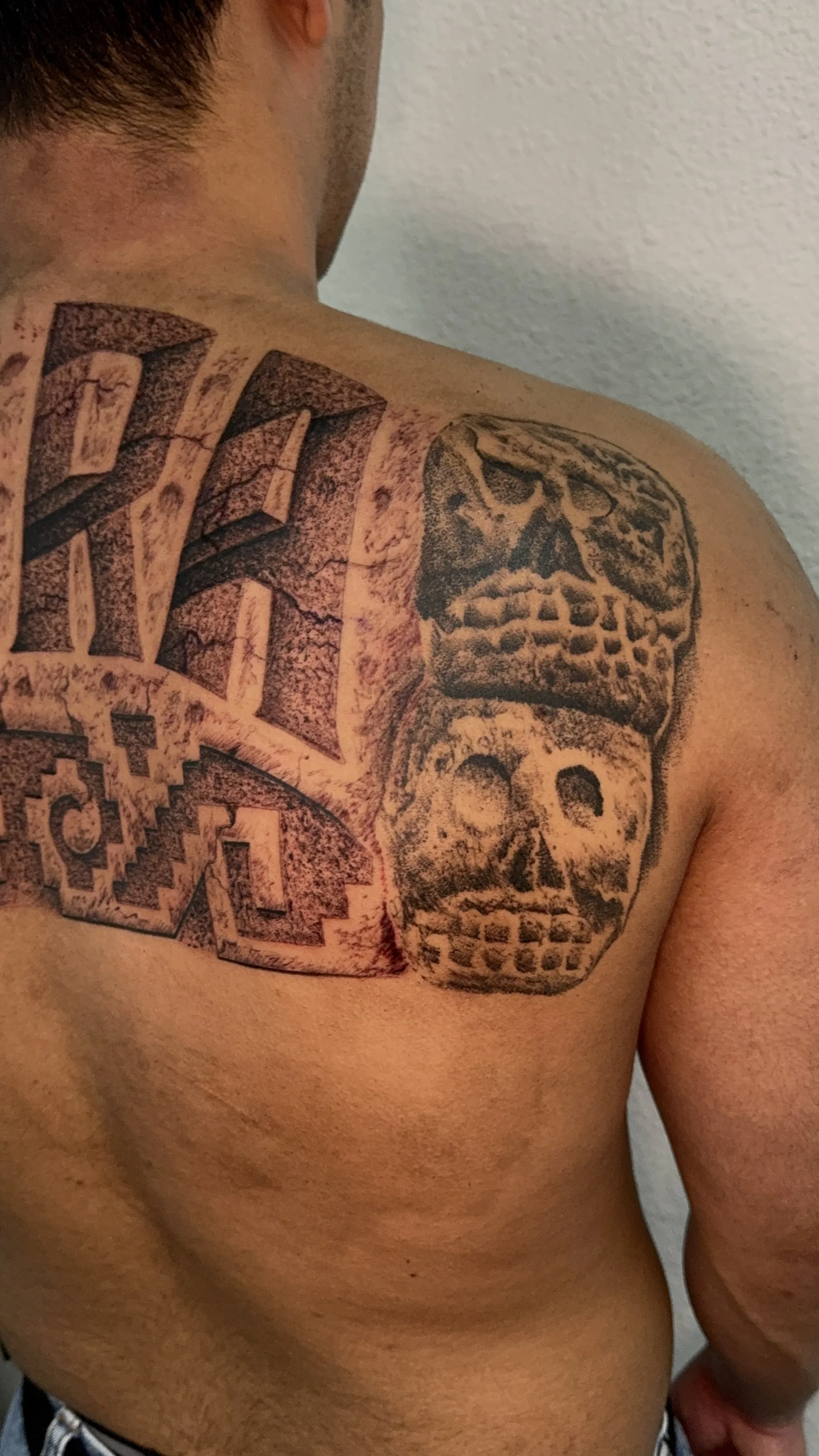 realism aztec skull tattoo on the back