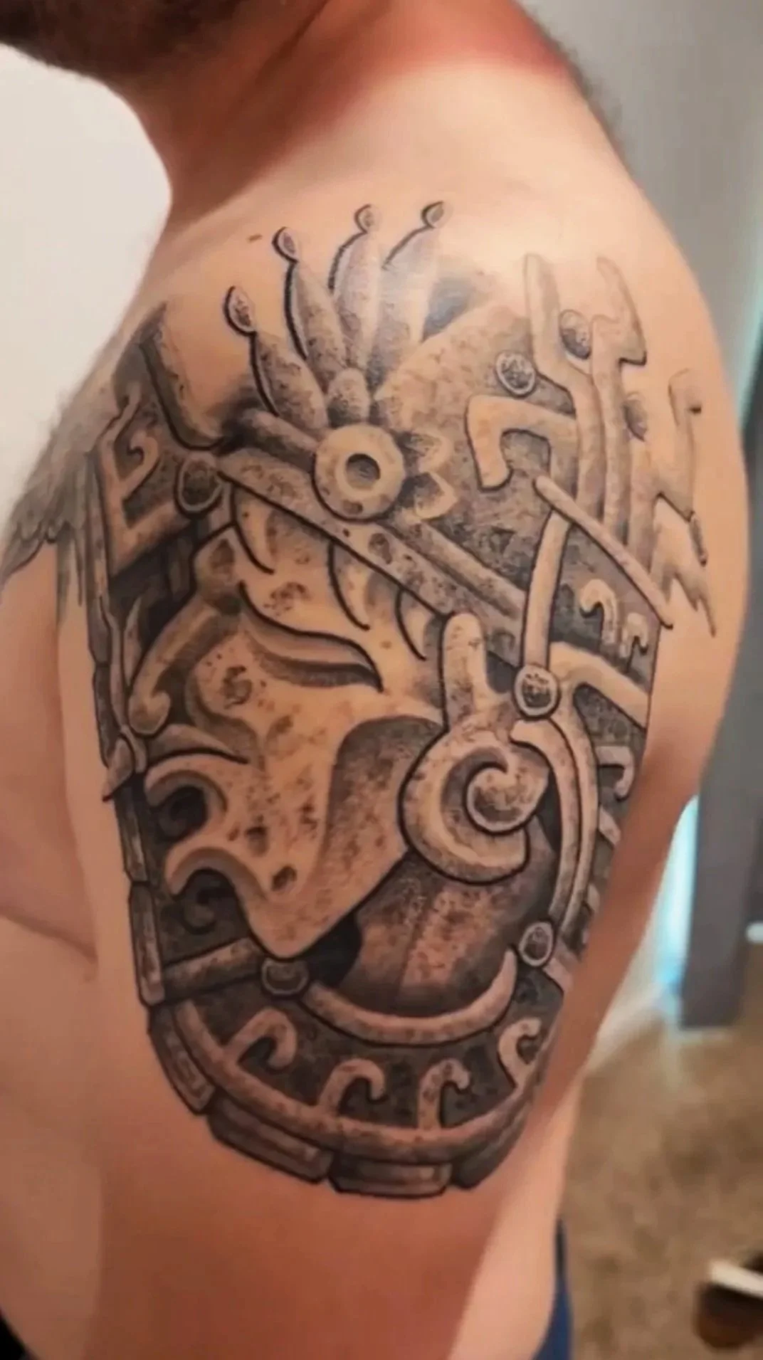 healed aztec warrior tattoo