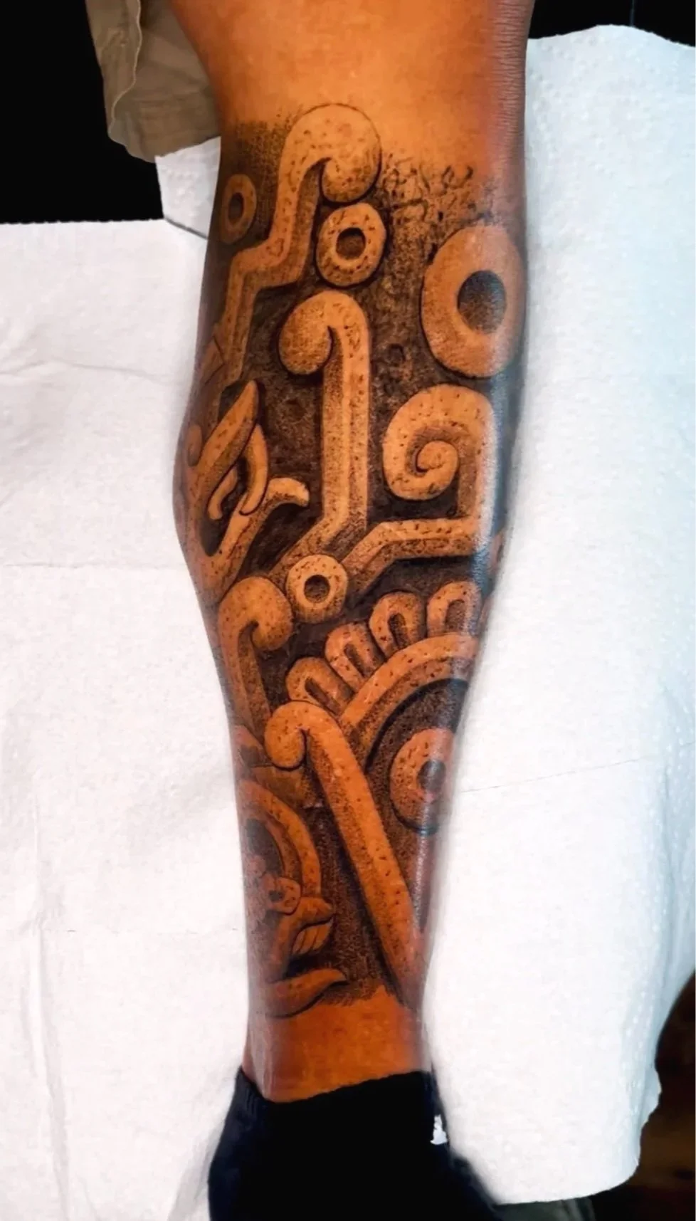 aztec ornamental tattoo on the leg