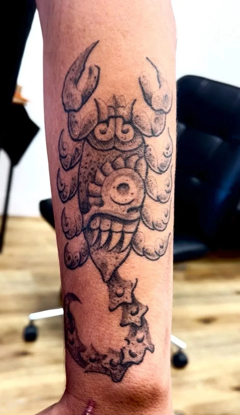 aztec scorpion tecpatl tattoo on the arm