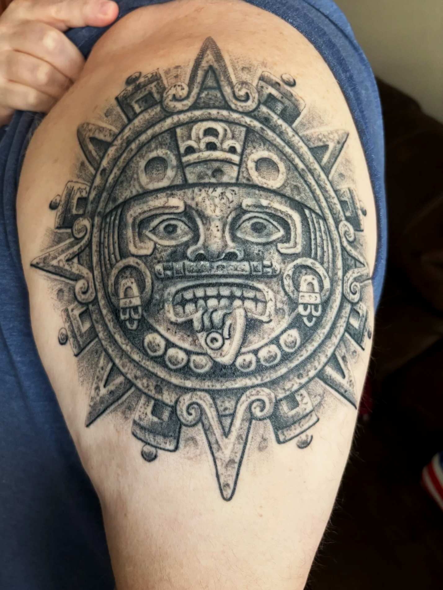 Healed aztec calender shoulder tattoo tonalpohualli