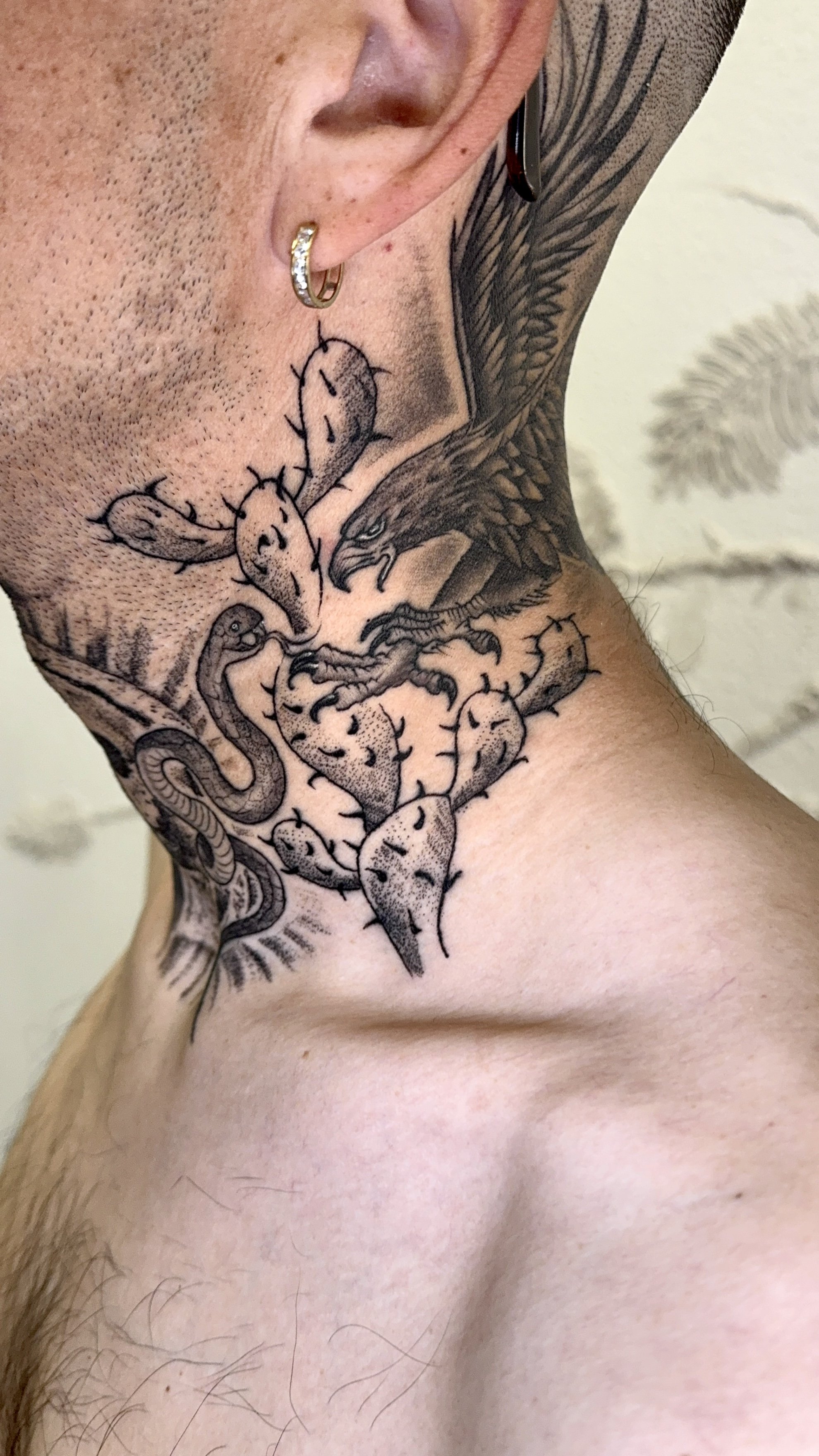 healed mexican coat of arms tattoo