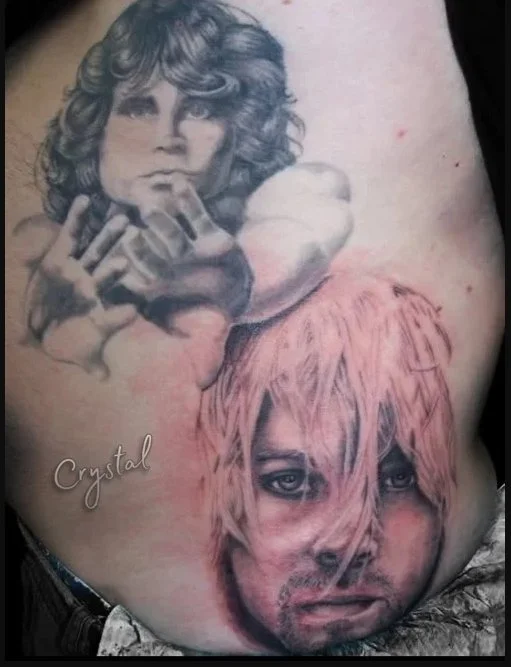Portrait tattoos of two faces. Nirvana's lead singer, Kurt Cobain and The Doors lead singer Jim Morrison.
