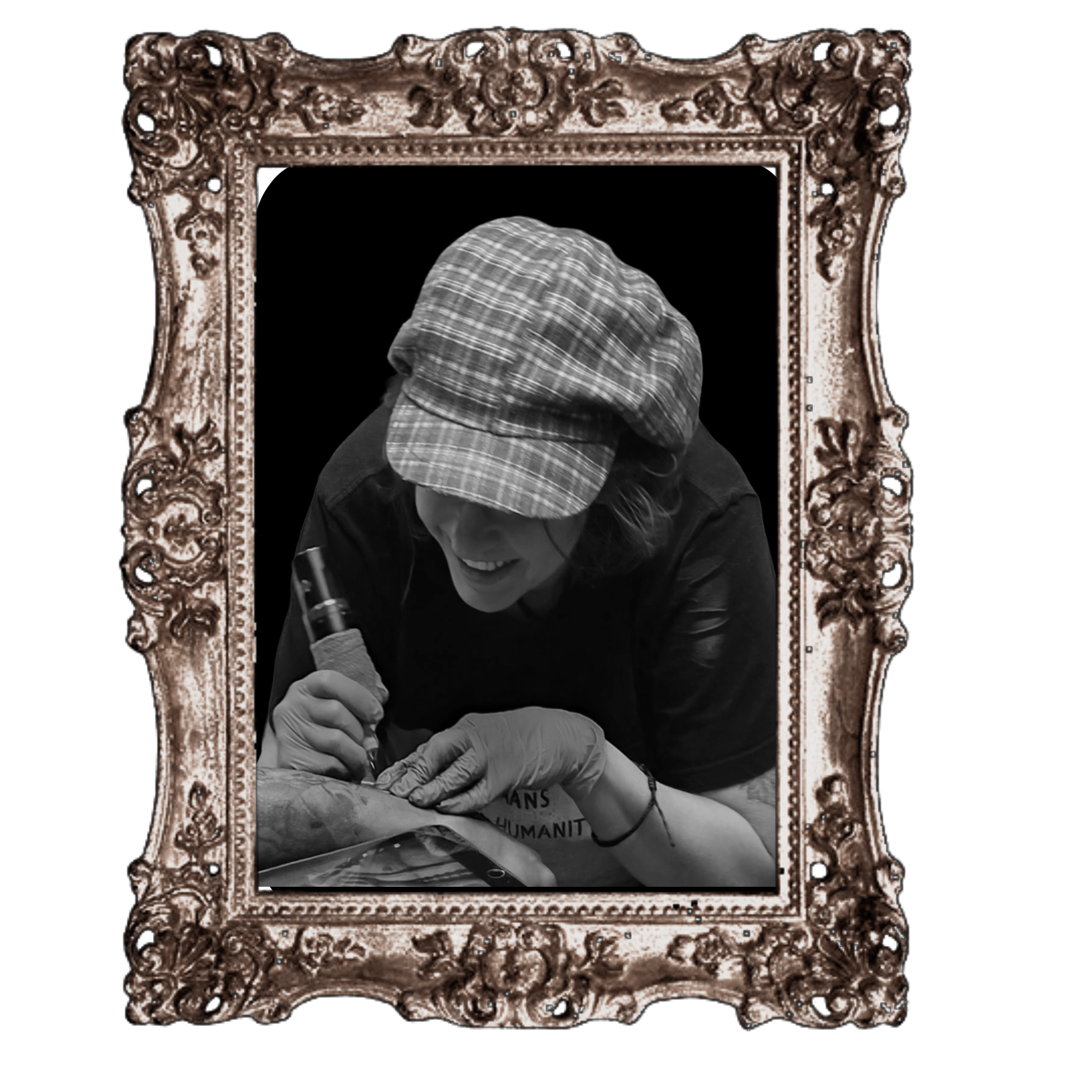 Crystal smiling behind a decorative ornate mirror frame.