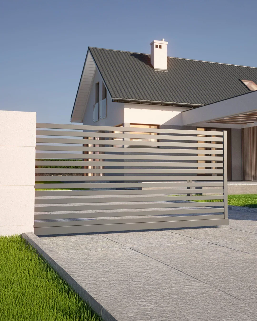 Modern house with a sloped roof, chimney, and a metal slat fence, surrounded by a paved walkway and green grass.