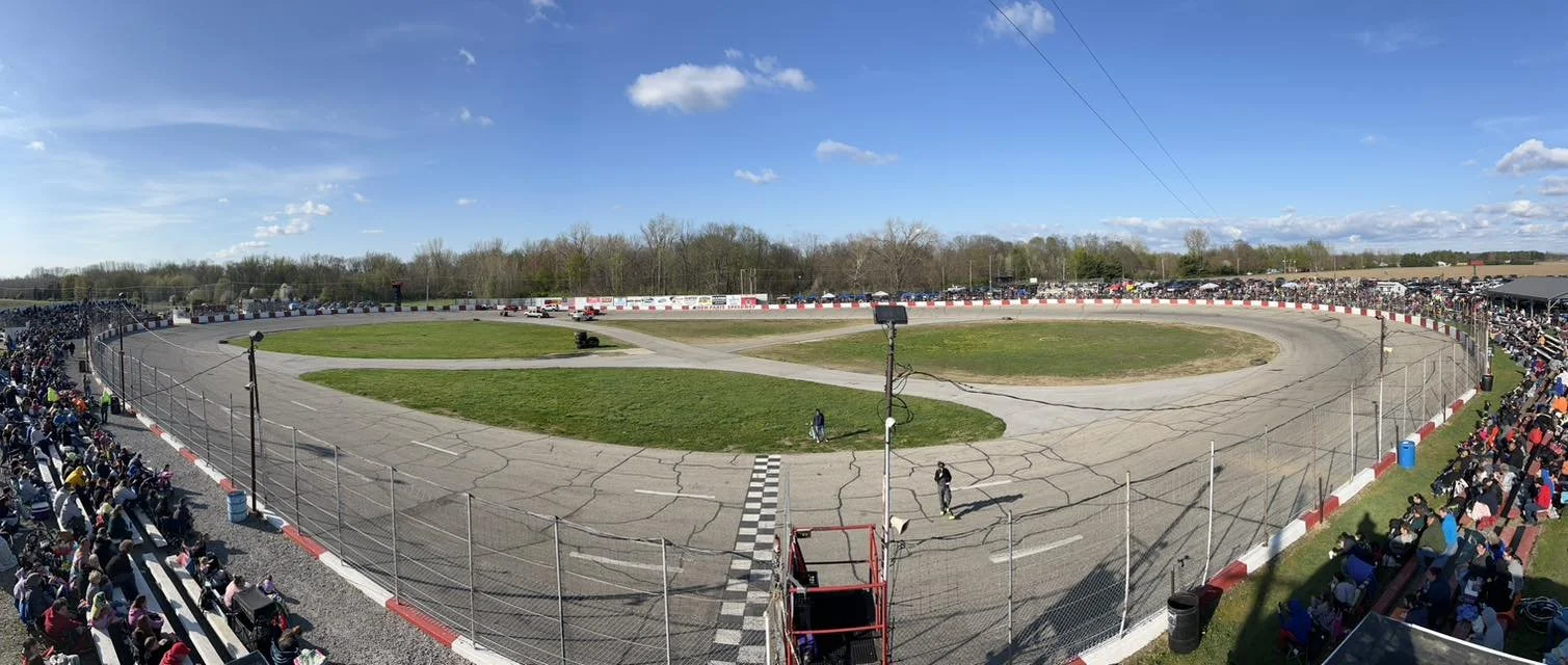 The New Paris Speedway in New Paris, Indiana with a crowd full of fans ready for action at The Hottest 1/4 Mile in the Midwest.