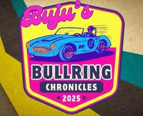 A colorful badge with a blue vintage car and a driver, titled 'Buju's Bullring Chronicles 2025' in bold pink, purple, and white text.