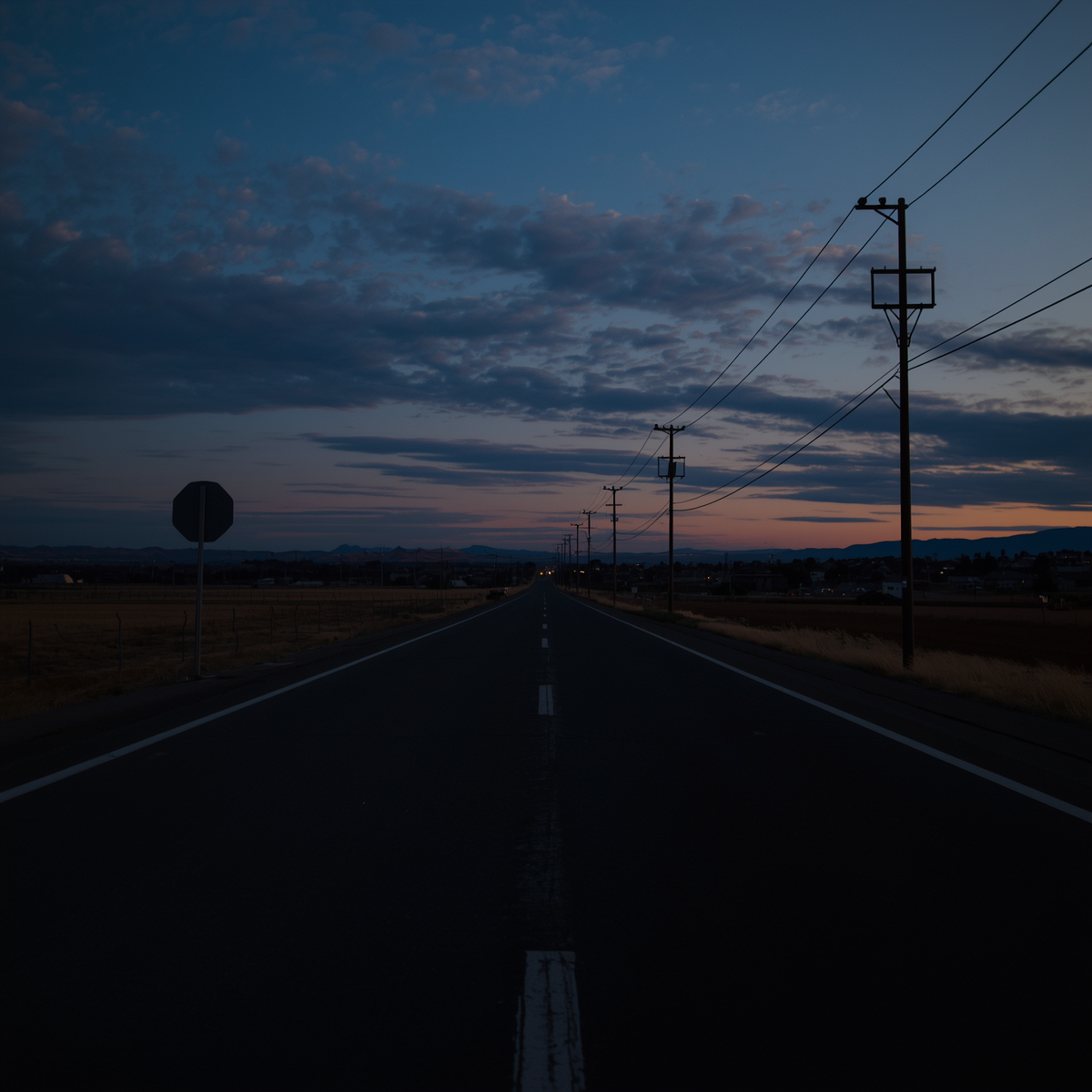 A quiet California roadside at dusk suggests the isolation and unease surrounding the Edmund Kemper case.