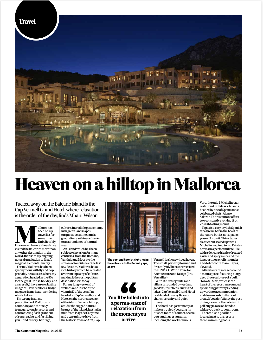 Luxury hotel with swimming pool at night, overlooking hillside in Mallorca