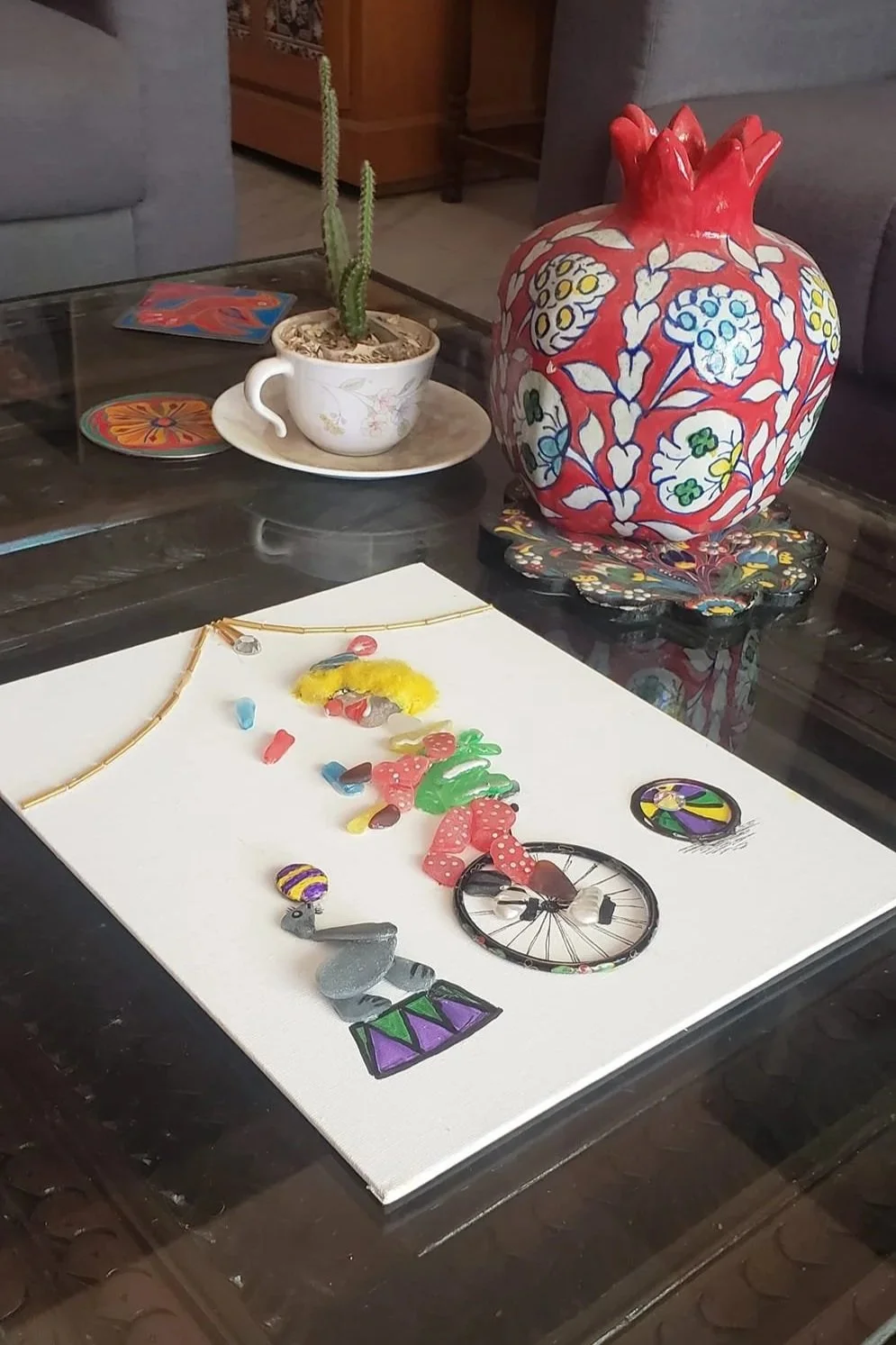 The artwork in process. Canvas places on a table.