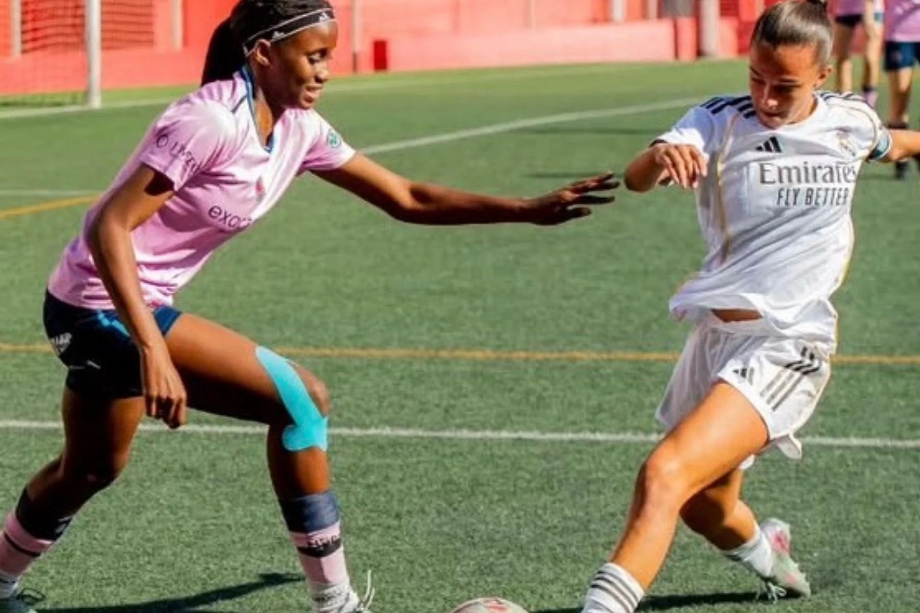 Young North Somerset girl footballer playing against Real Madrid