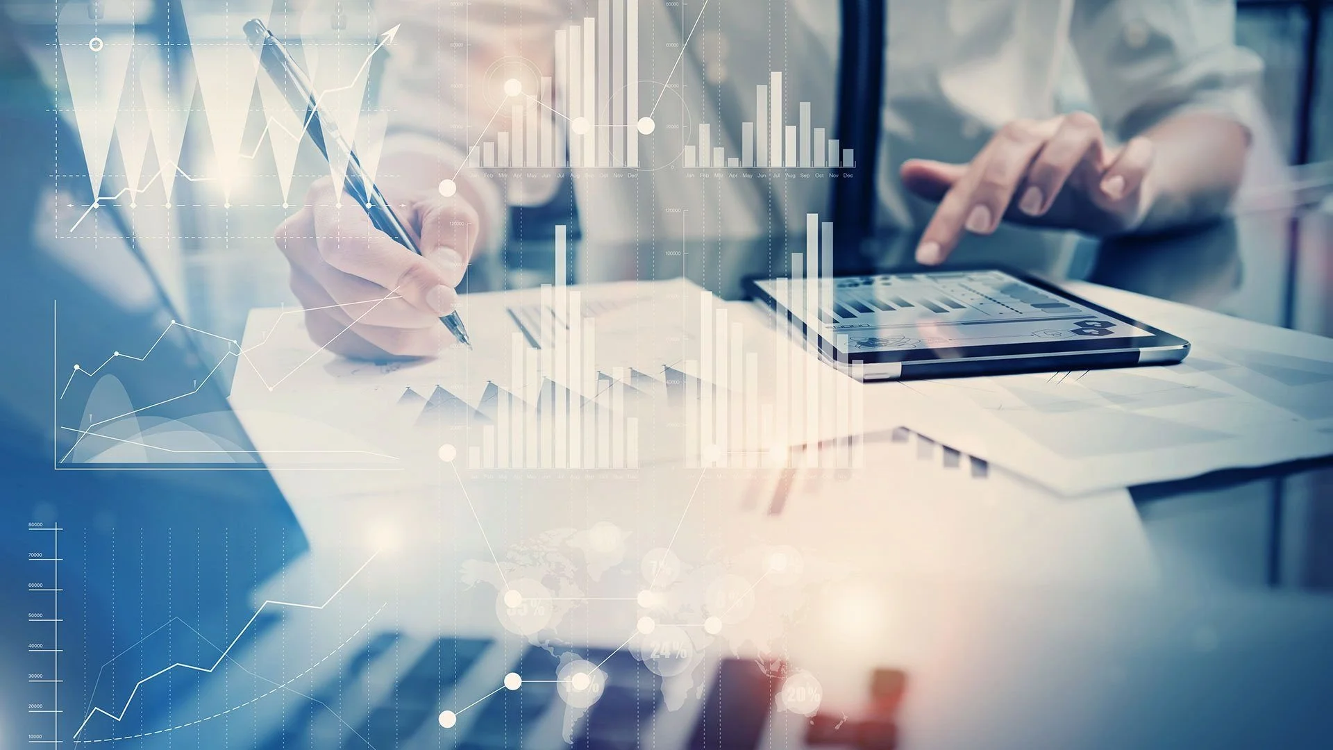 Businessperson analyzing financial data on tablet and paper with floating charts and graphs.