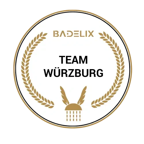 Logobild mit goldenen Lorbeerkränzen, der Text 'BADELIX TEAM WÜRZBURG' in der Mitte.