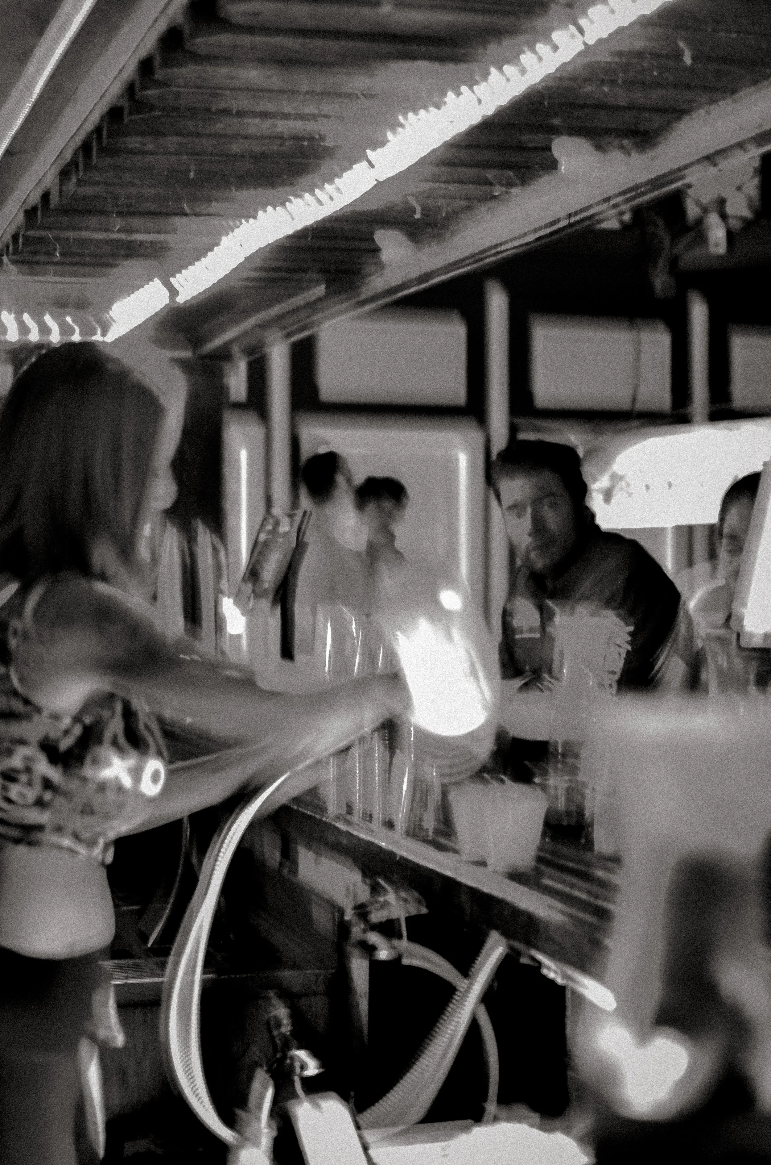 A bartender serves drinks at the bar. Fort Worth, Texas, USA. 10 August 2023.