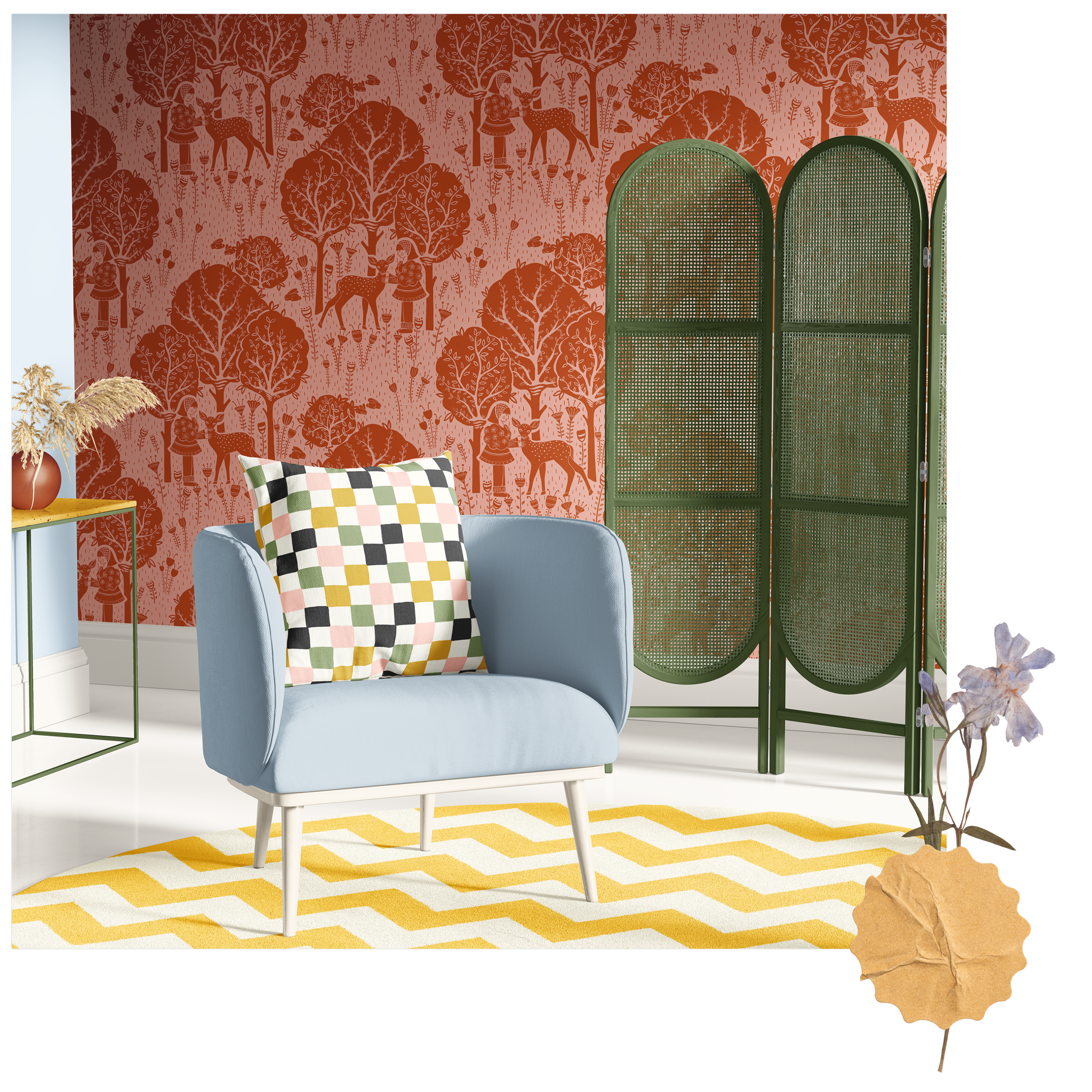 A light blue armchair with a multicolored checkered pillow, a yellow and white zigzag rug, a green folding room divider, a yellow side table with a brown vase and dried plants, a pink and red wallpaper with a woodland pattern, and a dried flower arrangement on the floor.