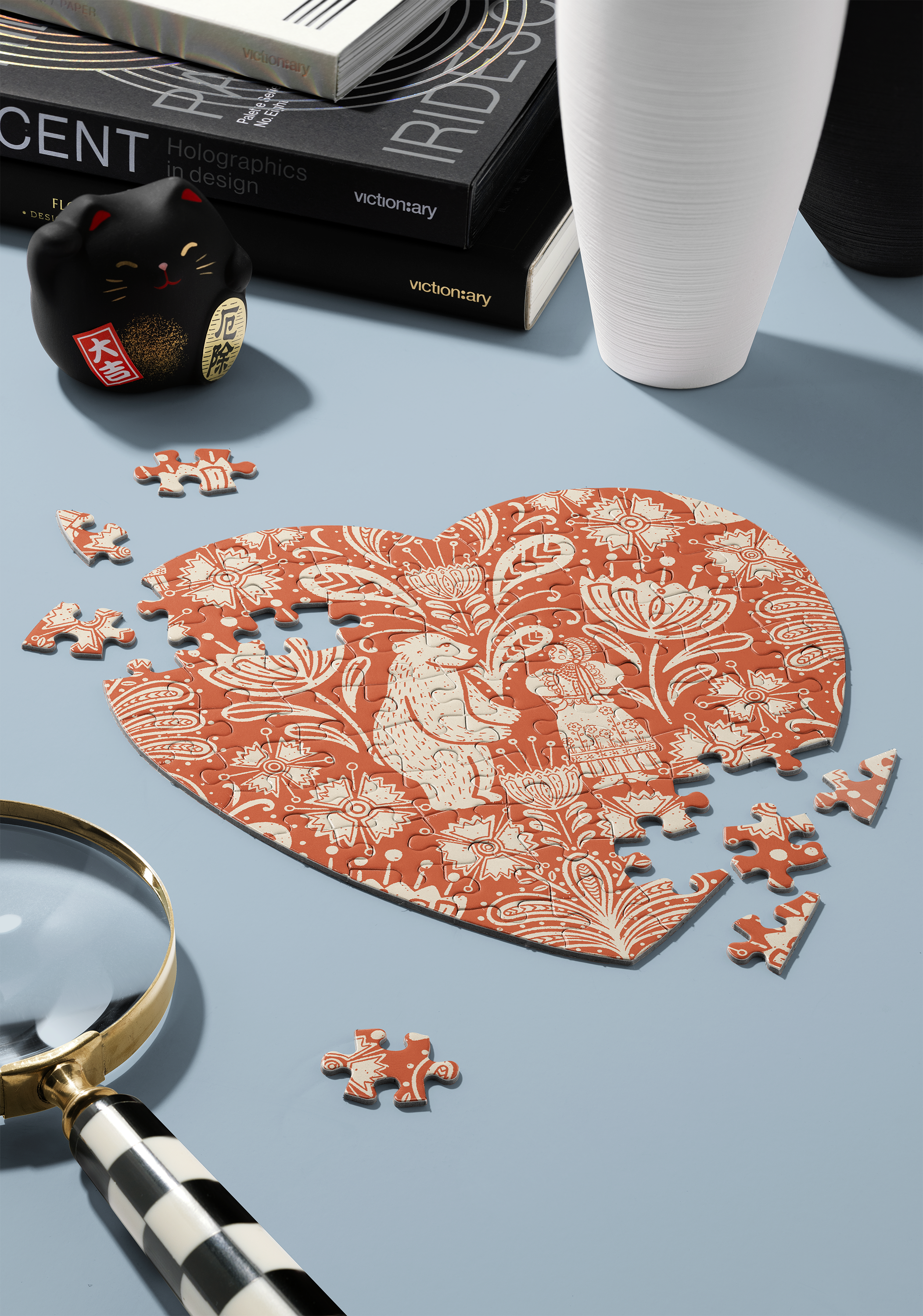 Puzzles in a shape of a heart with Bear Folk block print style pattern by Eve Howe - Pesky Cat Studio; the pattern has terracotta background and figures and motifs are cream/off white colour