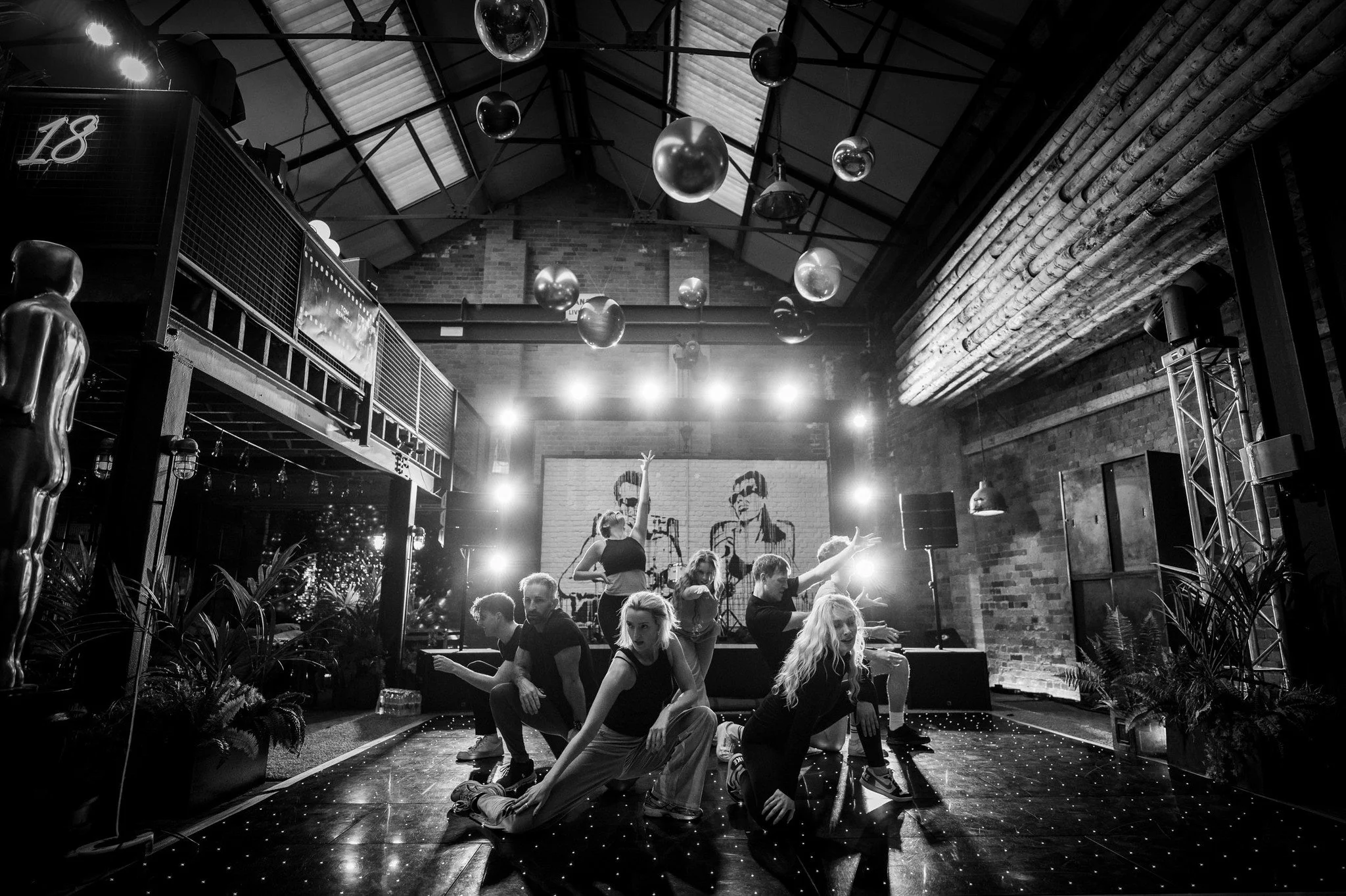 Stage performance translated into controlled monochrome.
High contrast lighting shaped to emphasise movement and form.

#StagePhotography
#LiveEventUK
#ConferencePhotography